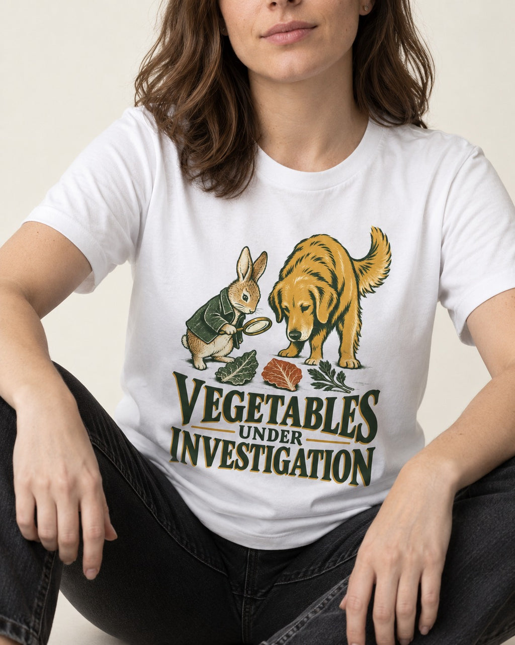 Golden Retriever Vegetables Under Investigation Rabbit Detective Graphic T-Shirt in White, worn by a seated model