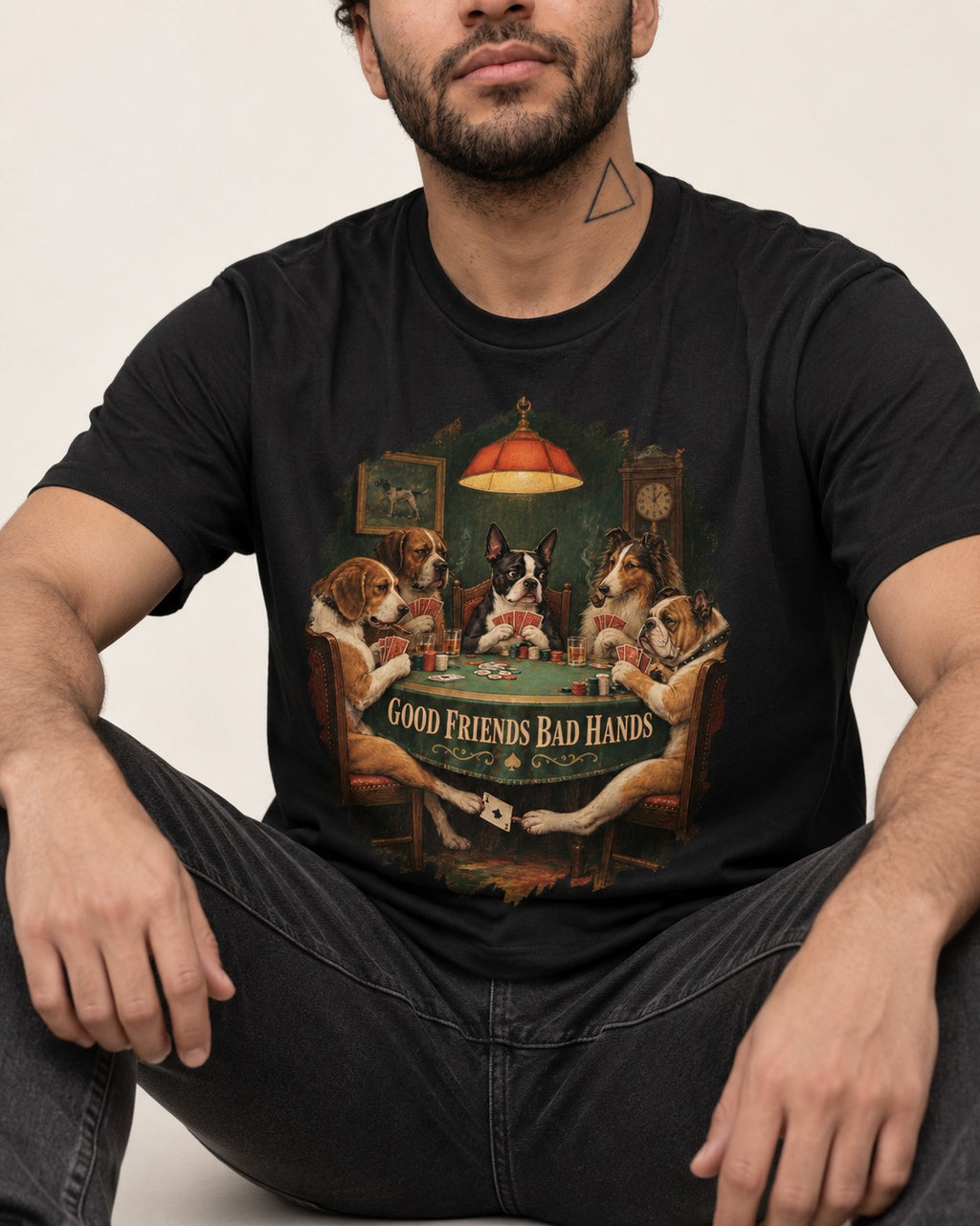 Good Friends Bad Hands Boston Terrier Poker Night T-Shirt in Black, worn by a seated model