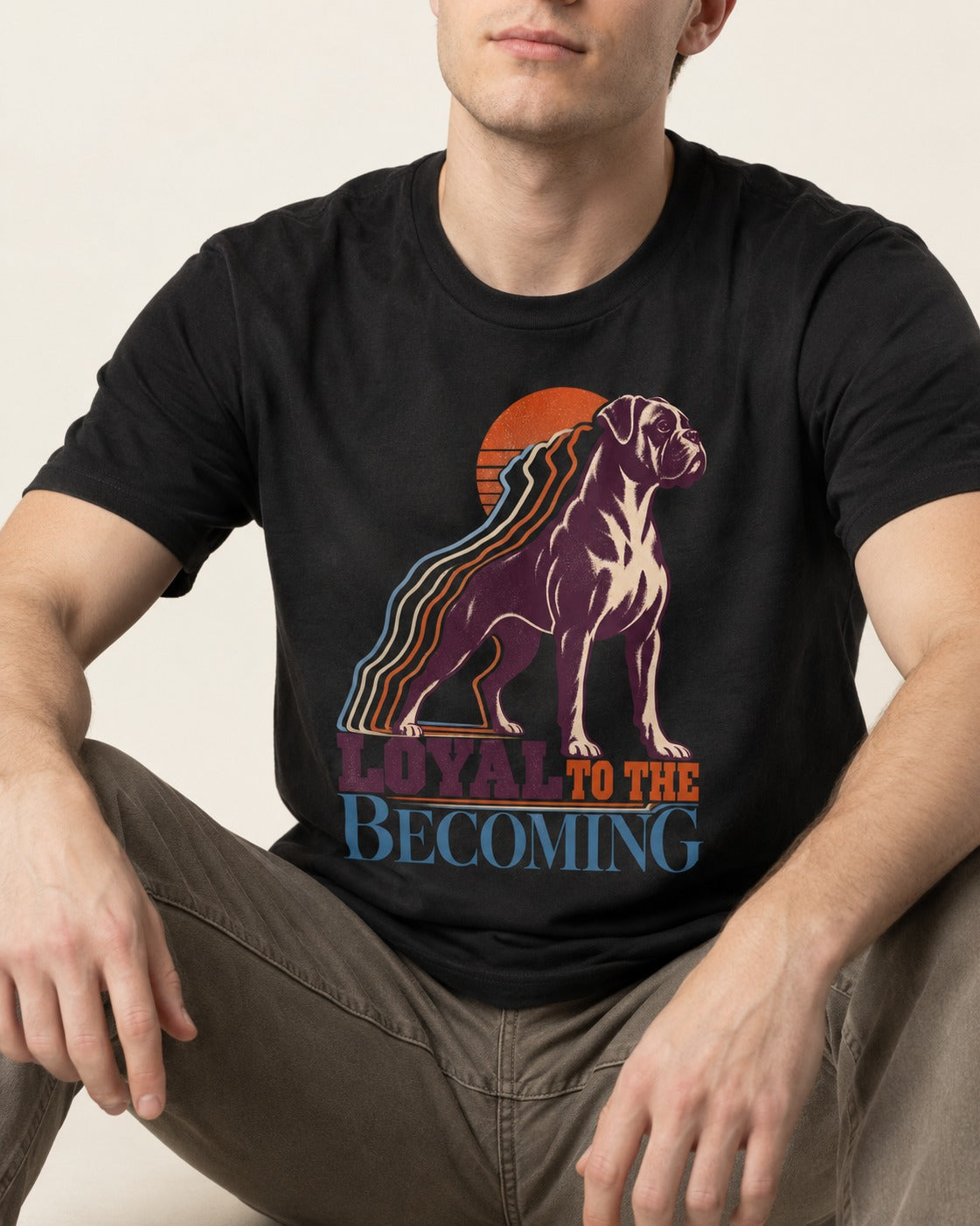 Boxer Loyal to the Becoming T-Shirt in Black, worn by a seated model