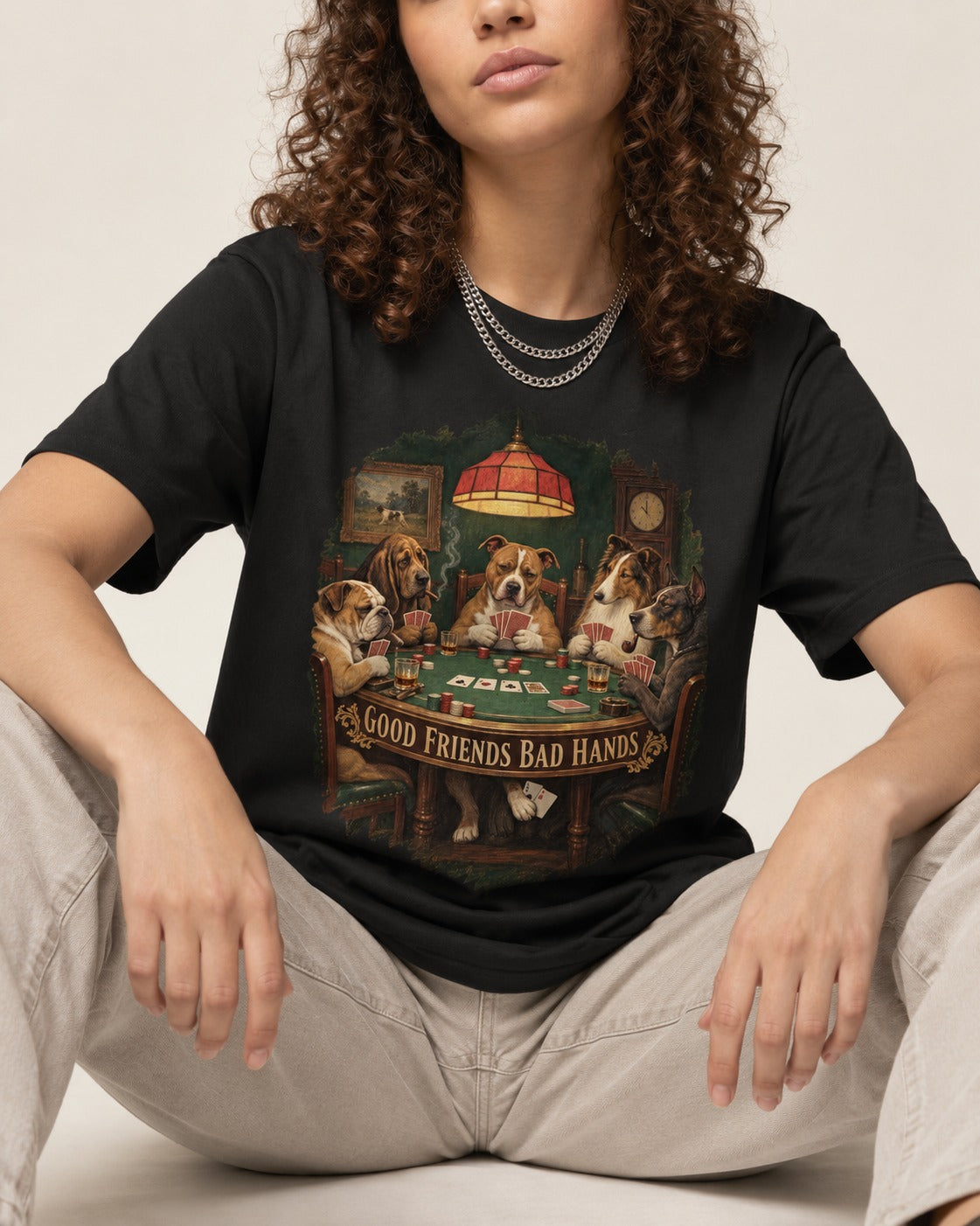 Pitbull Good Friends Bad Hands Poker Night Graphic T-Shirt in Black, worn by a seated model