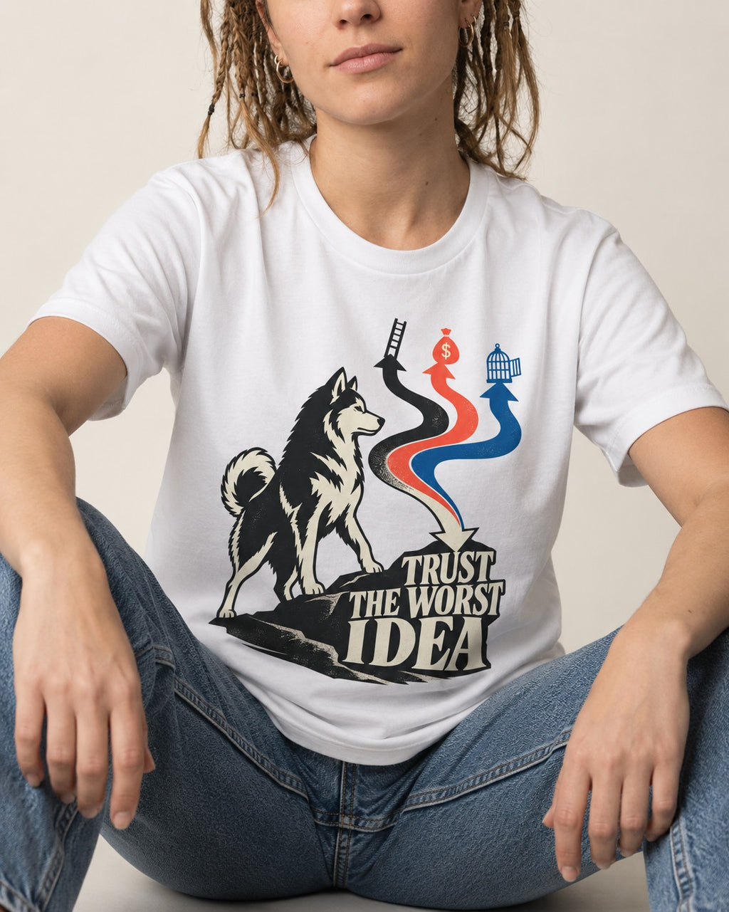 Trust the Worst Husky Idea T-Shirt in White, worn by a seated model