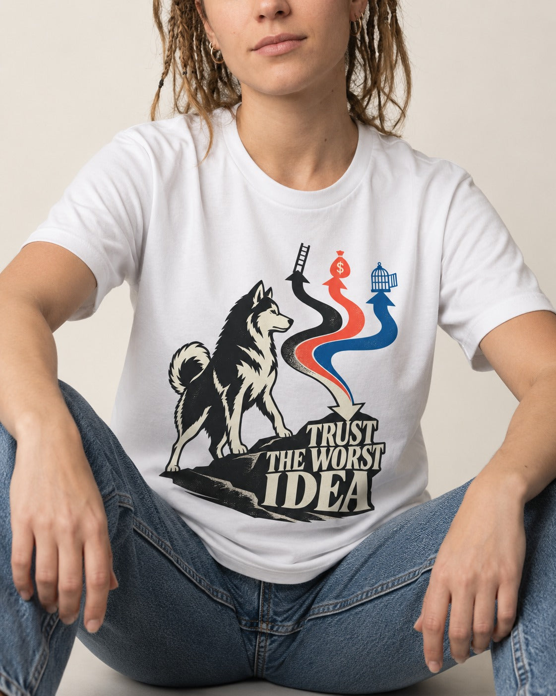 Trust the Worst Husky Idea T-Shirt in White, worn by a seated model