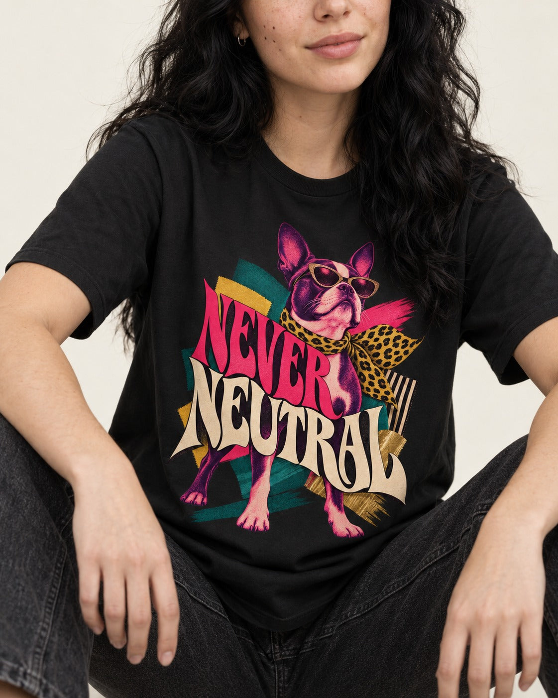 Boston Terrier Never Neutral Fashion Collage Graphic T-Shirt in Black, worn by a seated model