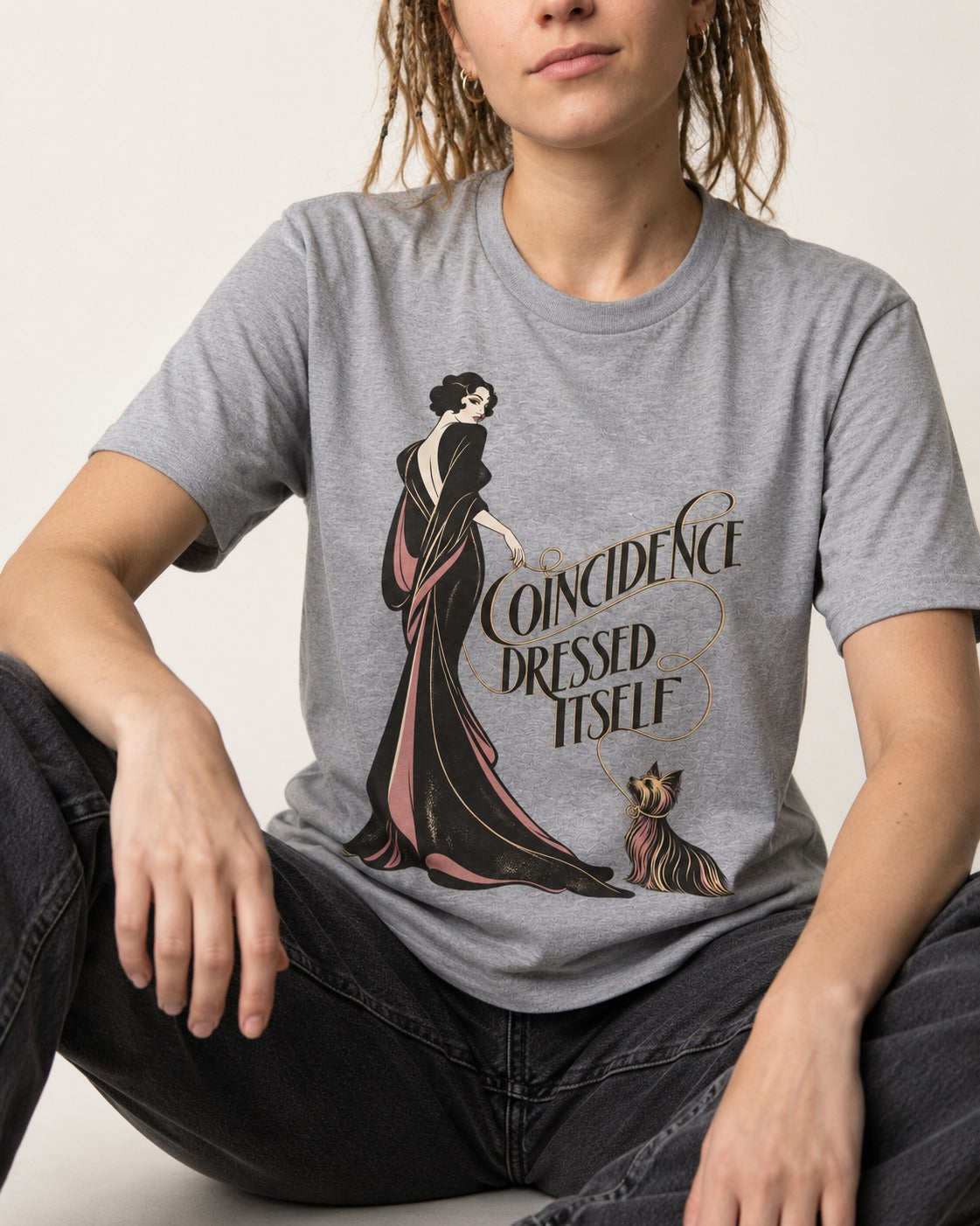 Yorkshire Terrier Coincidence Dressed Itself Art Deco Graphic T-Shirt in Sport Grey, worn by a seated model