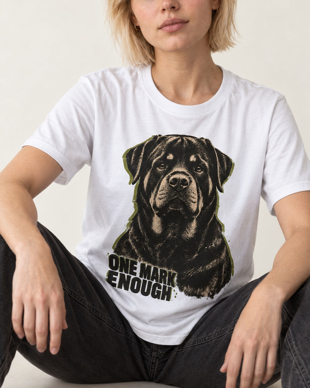 Rottweiler One Mark Enough T-Shirt in White, worn by a seated model