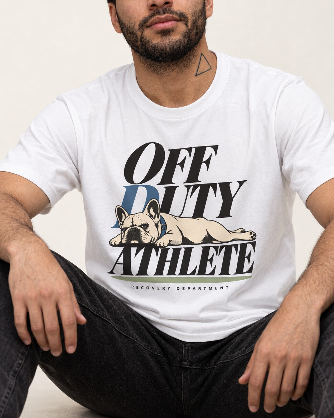 Off Duty Athlete Frenchie T-Shirt in White, worn by a seated model