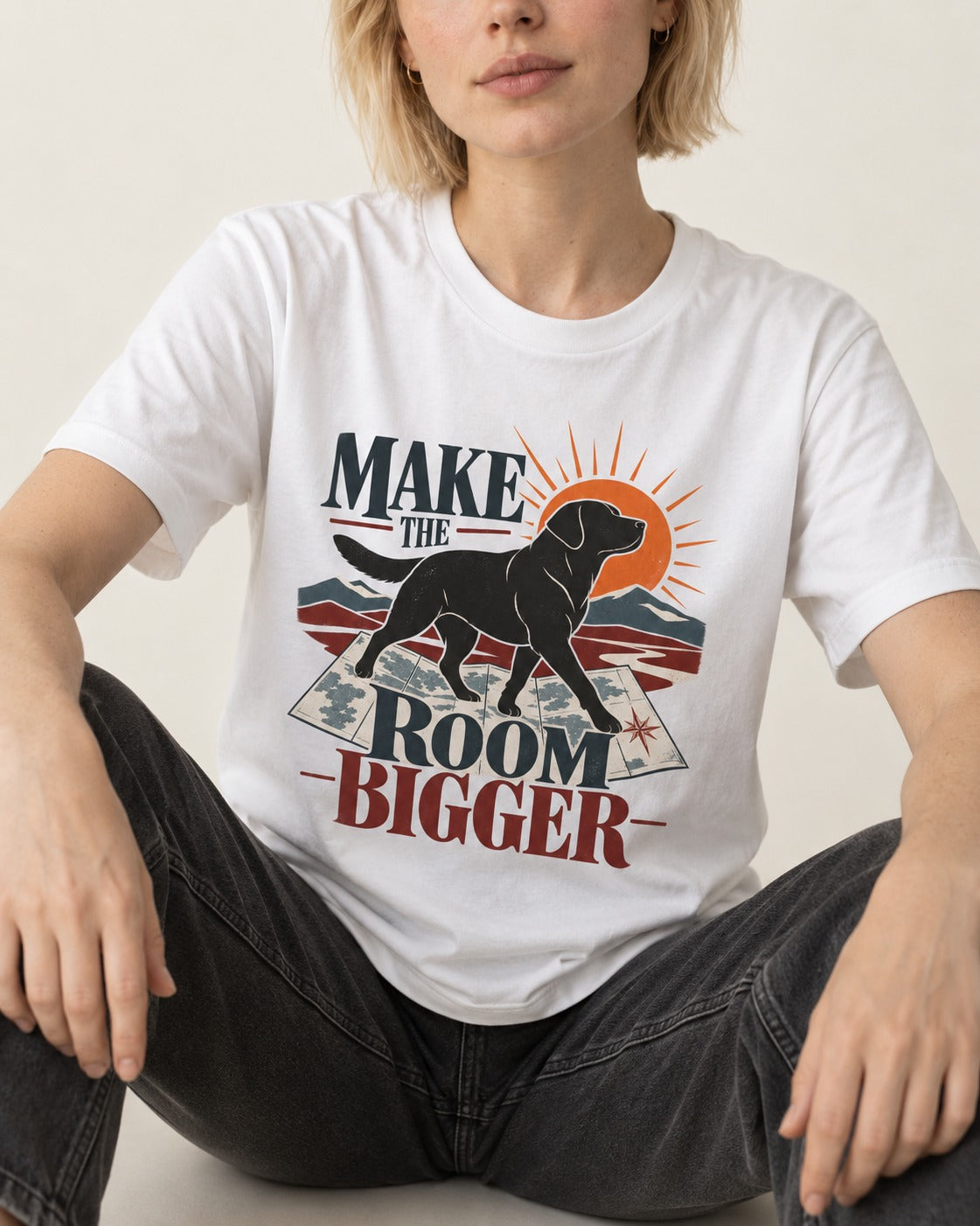 Make the Room Bigger Labrador Retriever T-Shirt in White, worn by a seated model