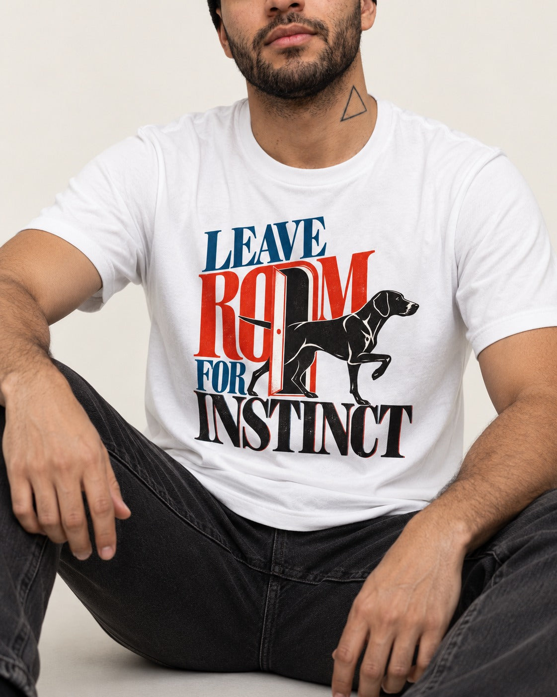 Leave Room for Instinct German Shorthaired Pointer T-Shirt in White, worn by a seated model