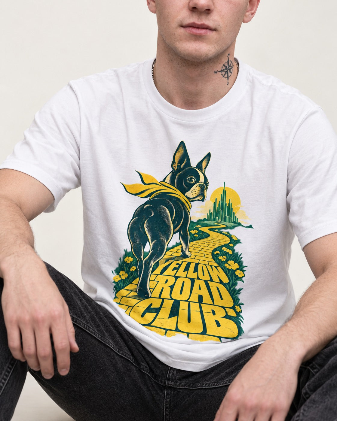 Boston Terrier Yellow Road Club T-Shirt in White, worn by a seated model