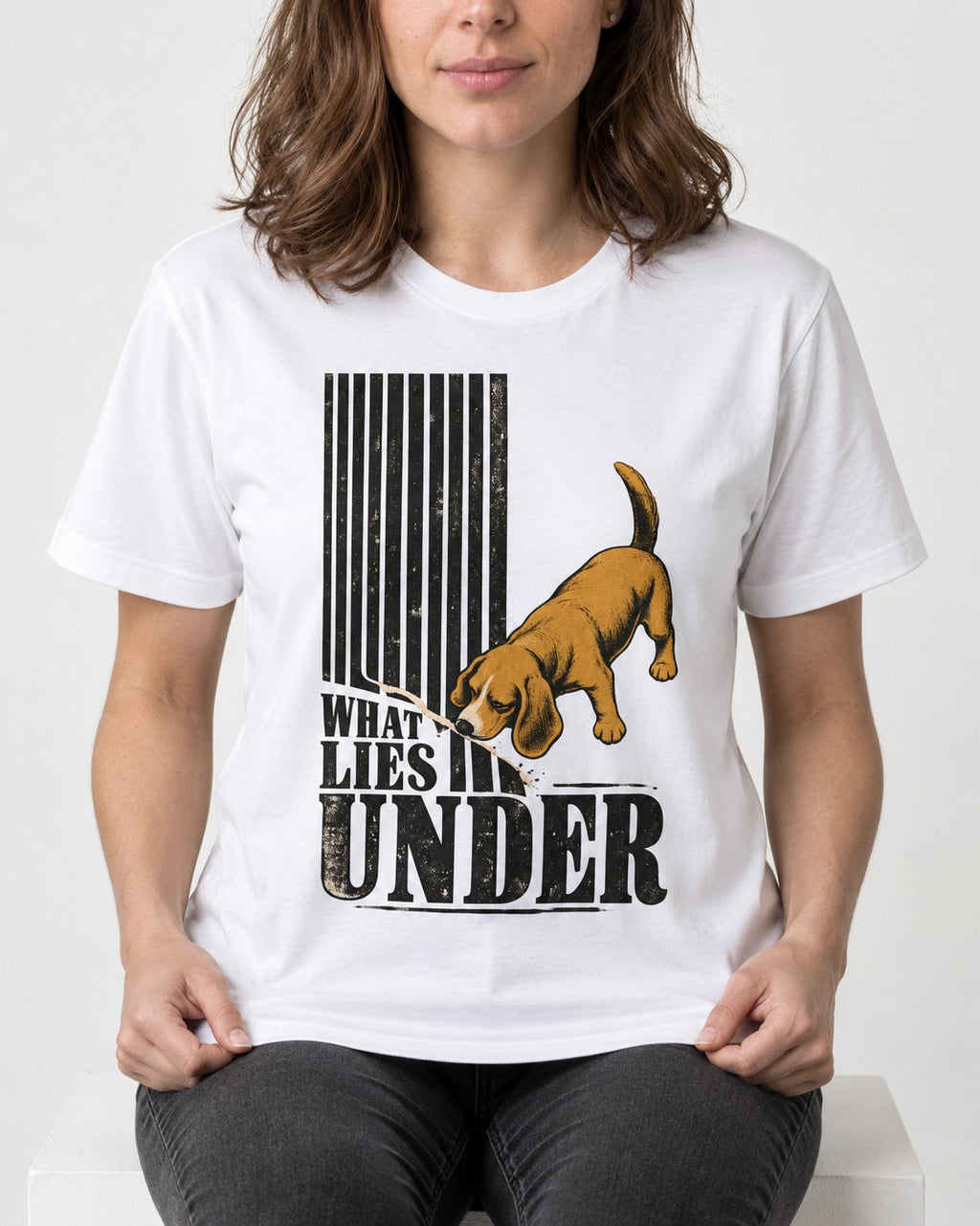 Beagle Knows What Lies Under T-Shirt in White, worn by a seated model
