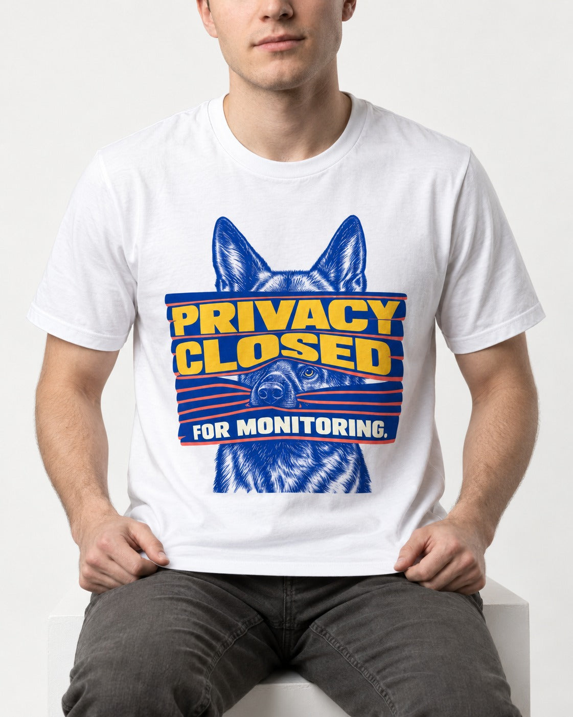German Shepherd Dog Privacy Closed for Monitoring T-Shirt in White, worn by a seated model