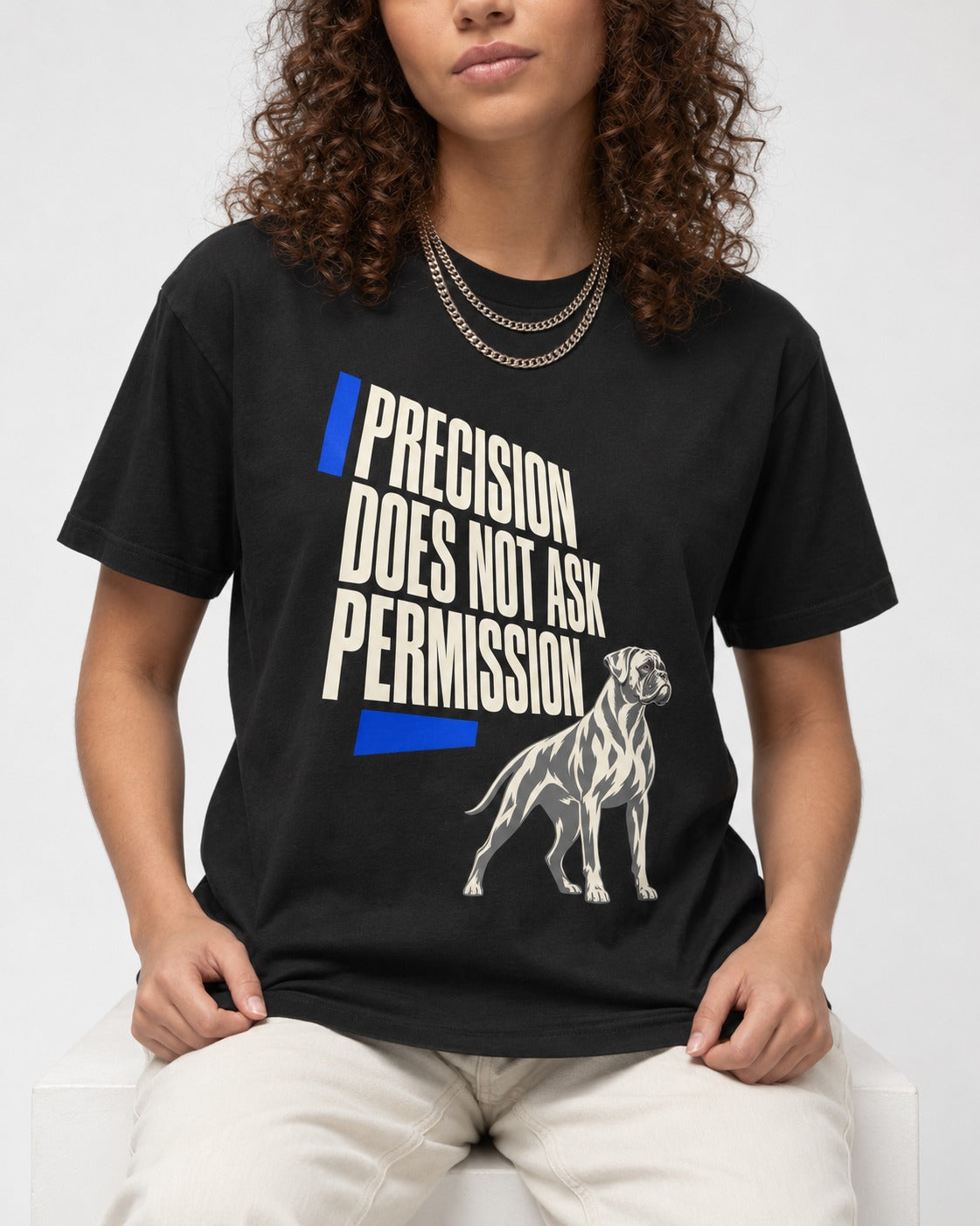 Precision Does Not Ask Permission Boxer T-Shirt in Black, worn by a seated model