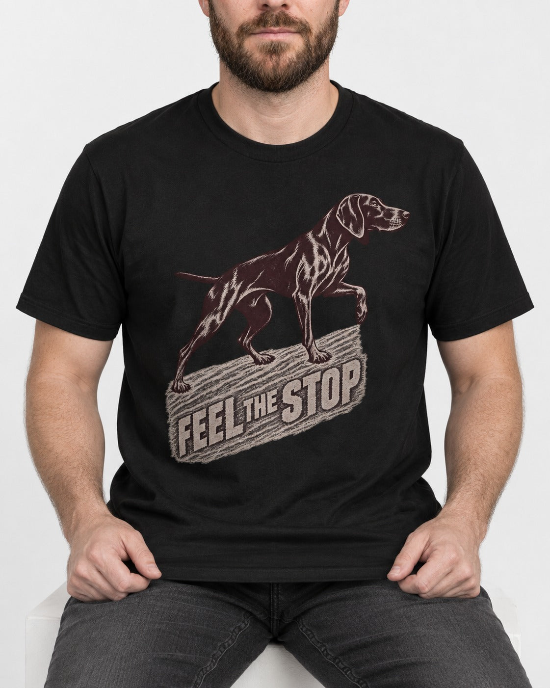 German Shorthaired Pointer Feel The Stop Frottage Graphic T-Shirt in Black, worn by a seated model