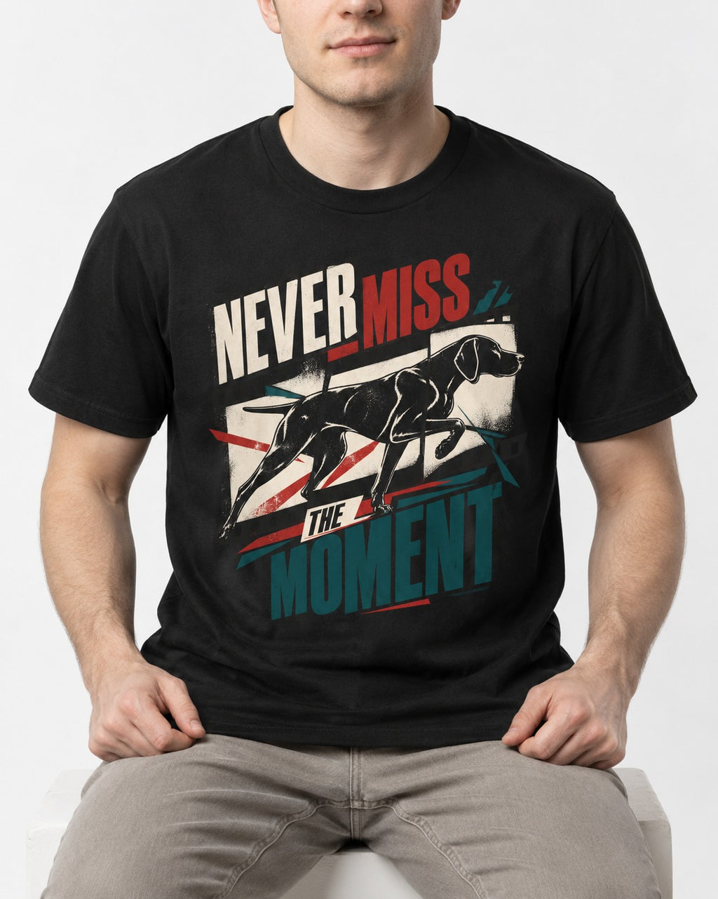 German Shorthaired Pointer Never Miss the Moment Filmstrip Graphic T-Shirt in Black, worn by a seated model