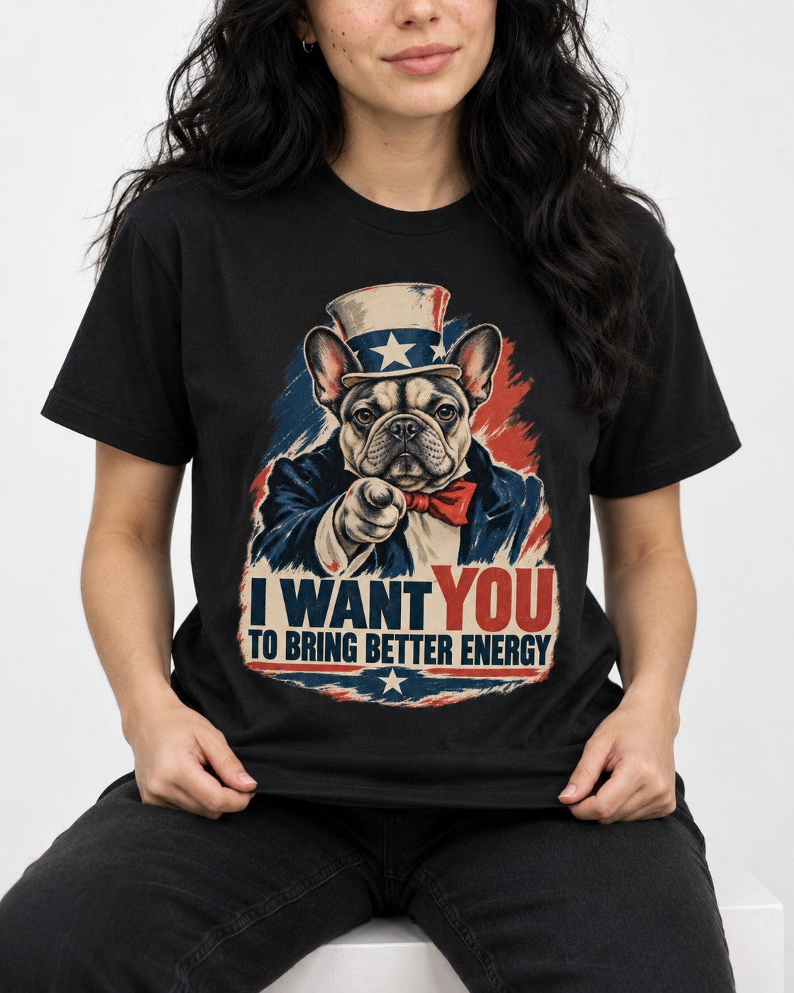 Frenchie I Want You to Bring Better Energy Recruitment Poster Graphic T-Shirt in Black, worn by a seated model