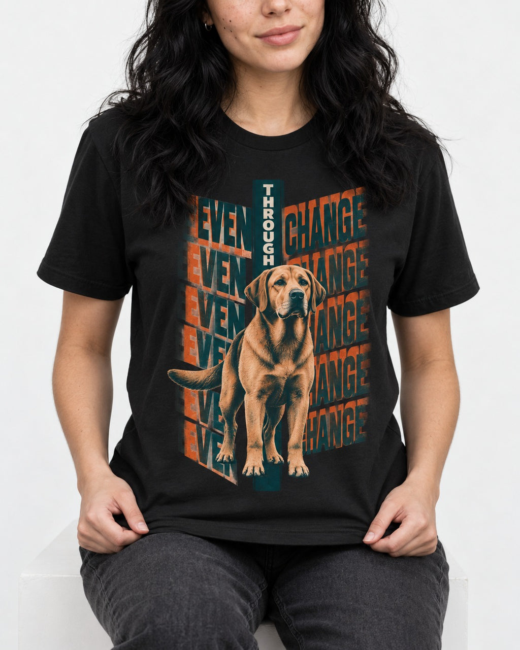Labrador Retriever Even Through Change Repeated Poster Graphic T-Shirt in Black, worn by a seated model