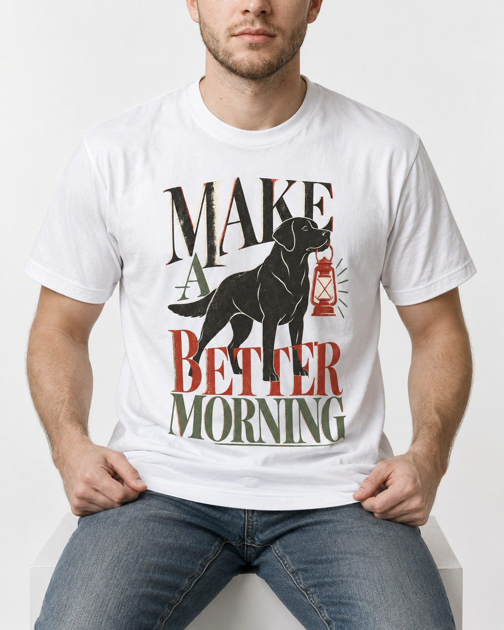 Make a Better Morning Labrador Retriever T-Shirt in White, worn by a seated model