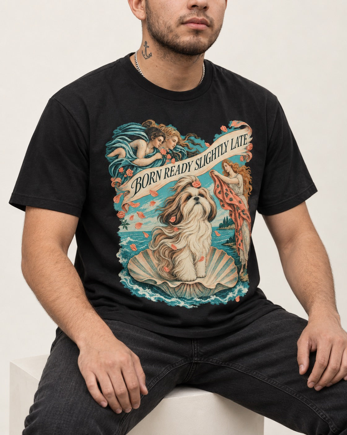 Shih Tzu Born Ready Slightly Late Venus Graphic T-Shirt in Black, worn by a seated model