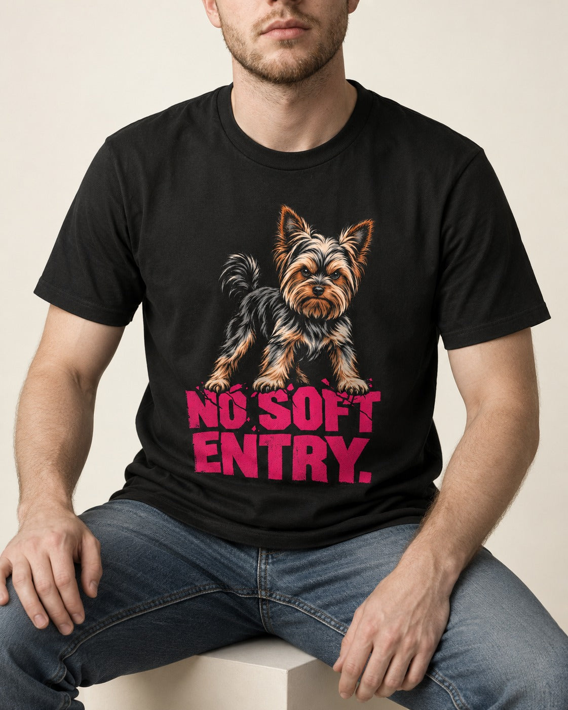 Yorkshire Terrier No Soft Entry Stance Graphic T-Shirt in Black, worn by a seated model
