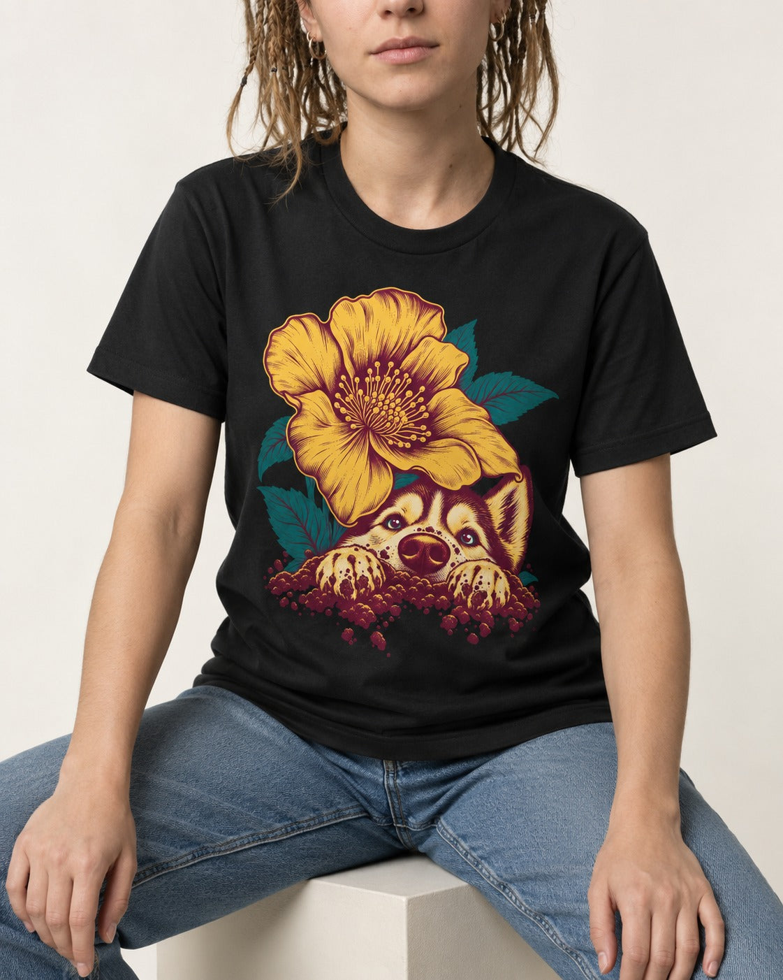 Husky Flower Witness Peeking Floral Graphic T-Shirt in Black, worn by a seated model