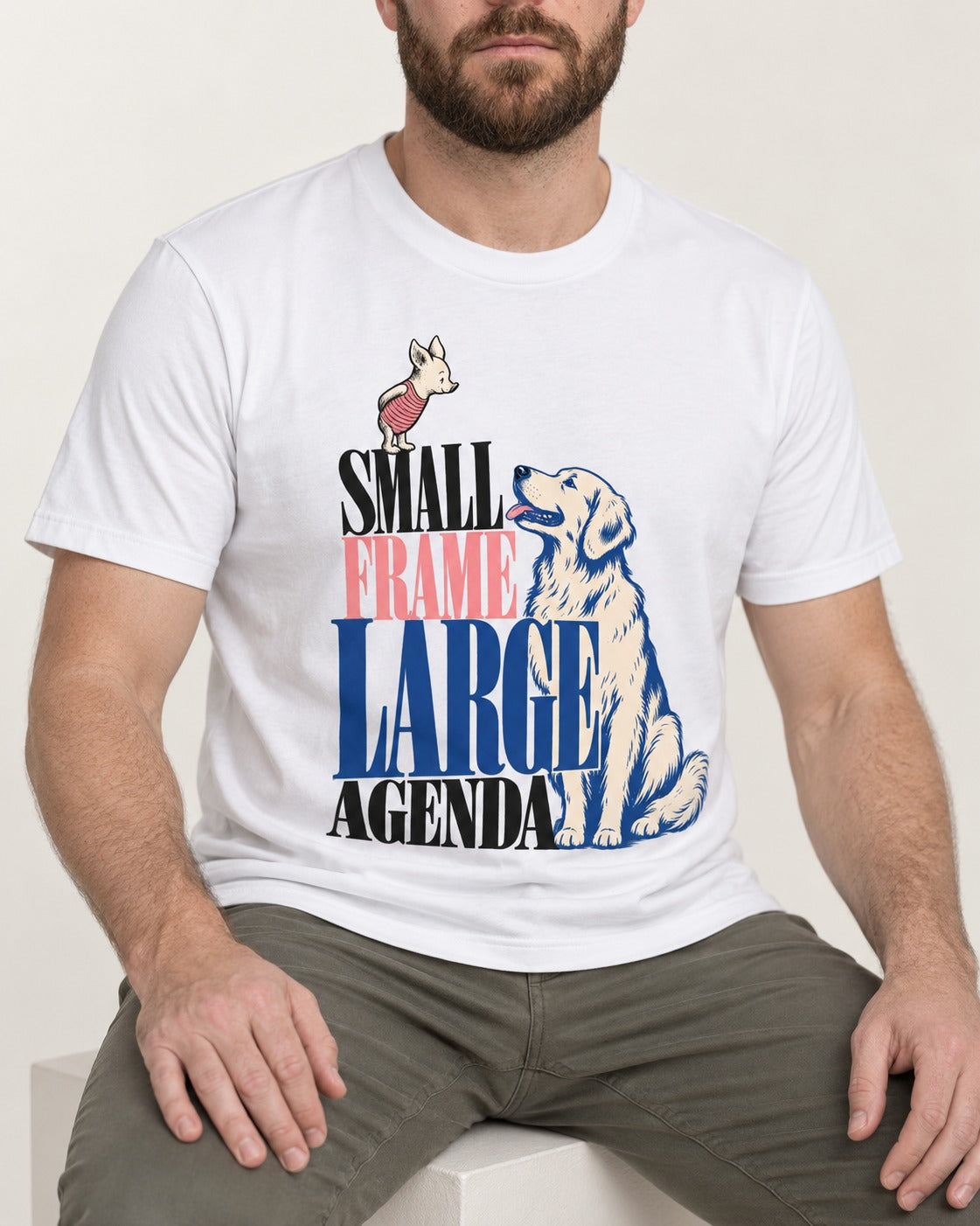 Small Frame Large Agenda Golden Retriever T-Shirt in White, worn by a seated model