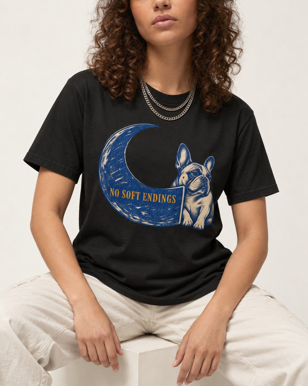 Frenchie No Soft Endings Crescent Graphic T-Shirt in Black, worn by a seated model