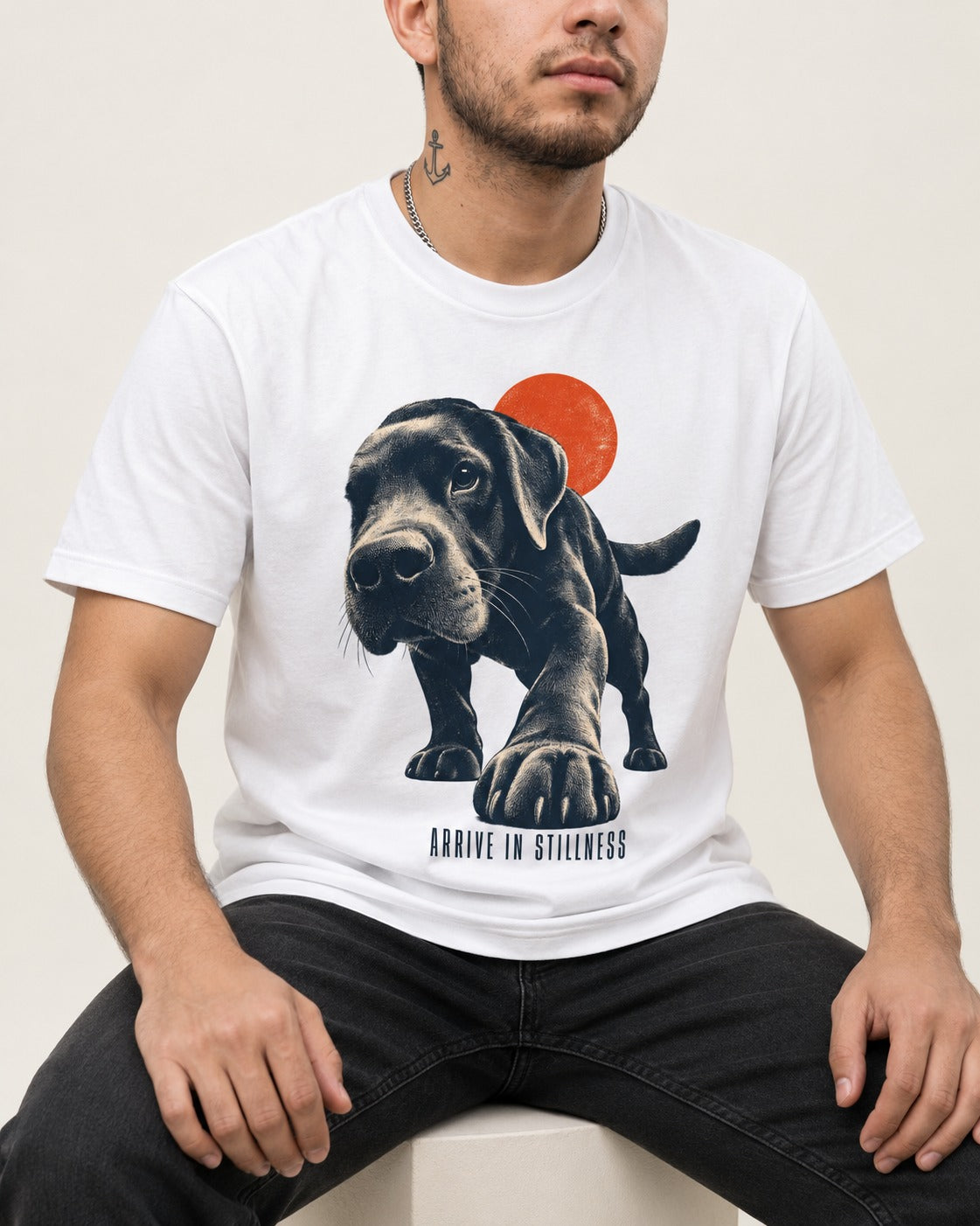 Labrador Retriever Arrive in Stillness T-Shirt in White, worn by a seated model