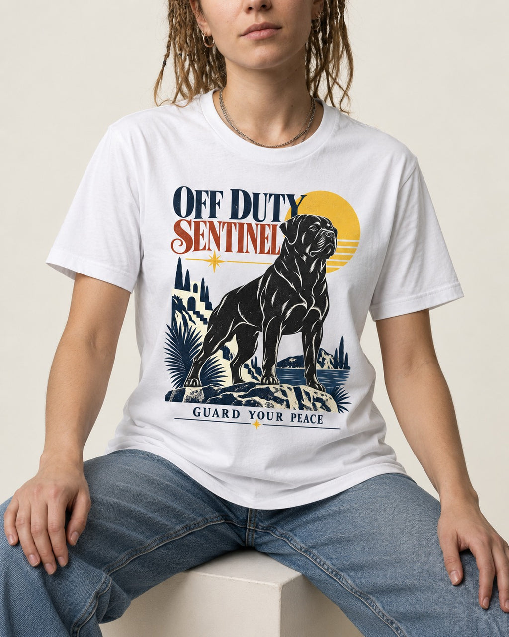 Off Duty Rottweiler Sentinel T-Shirt in White, worn by a seated model