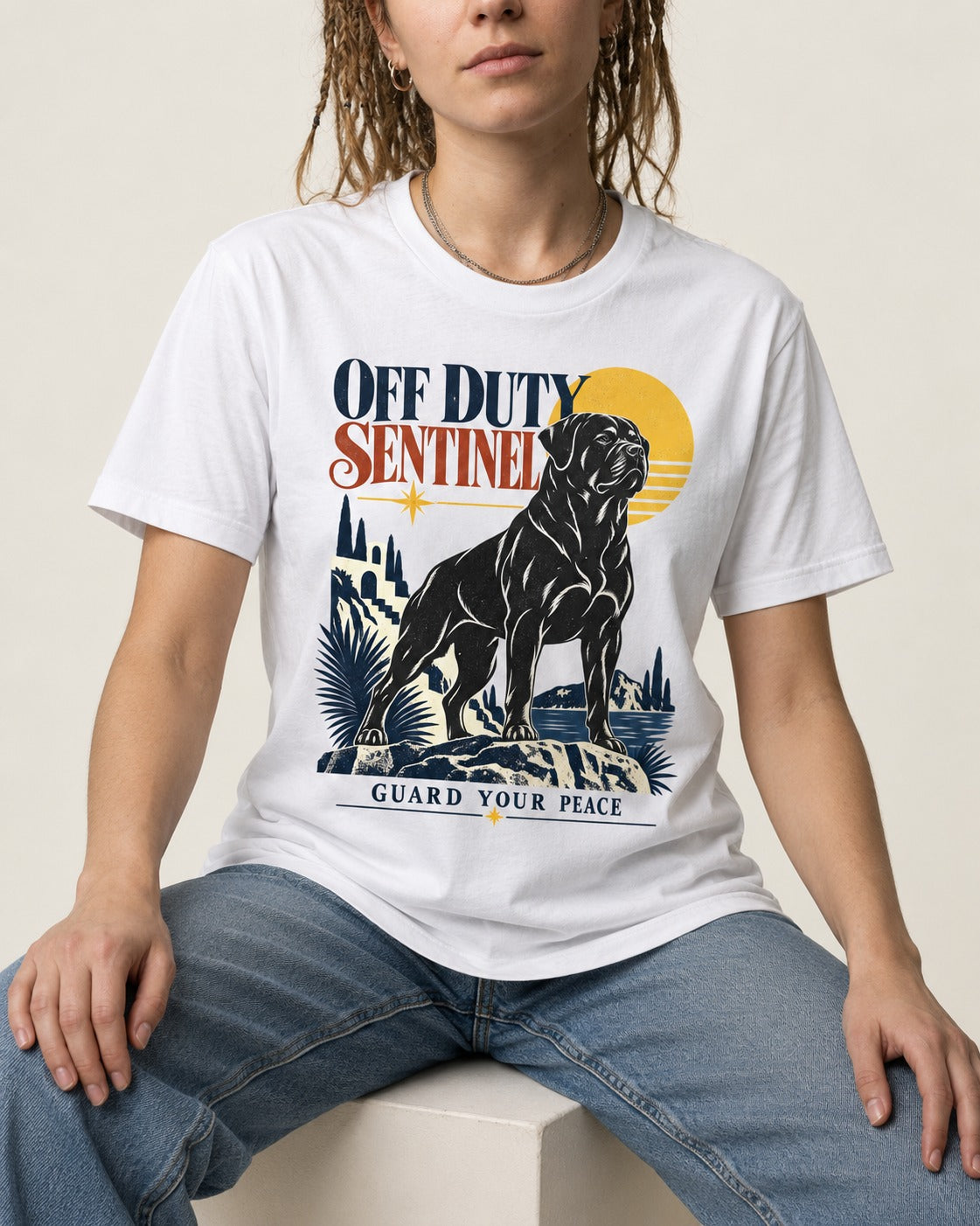Off Duty Rottweiler Sentinel T-Shirt in White, worn by a seated model