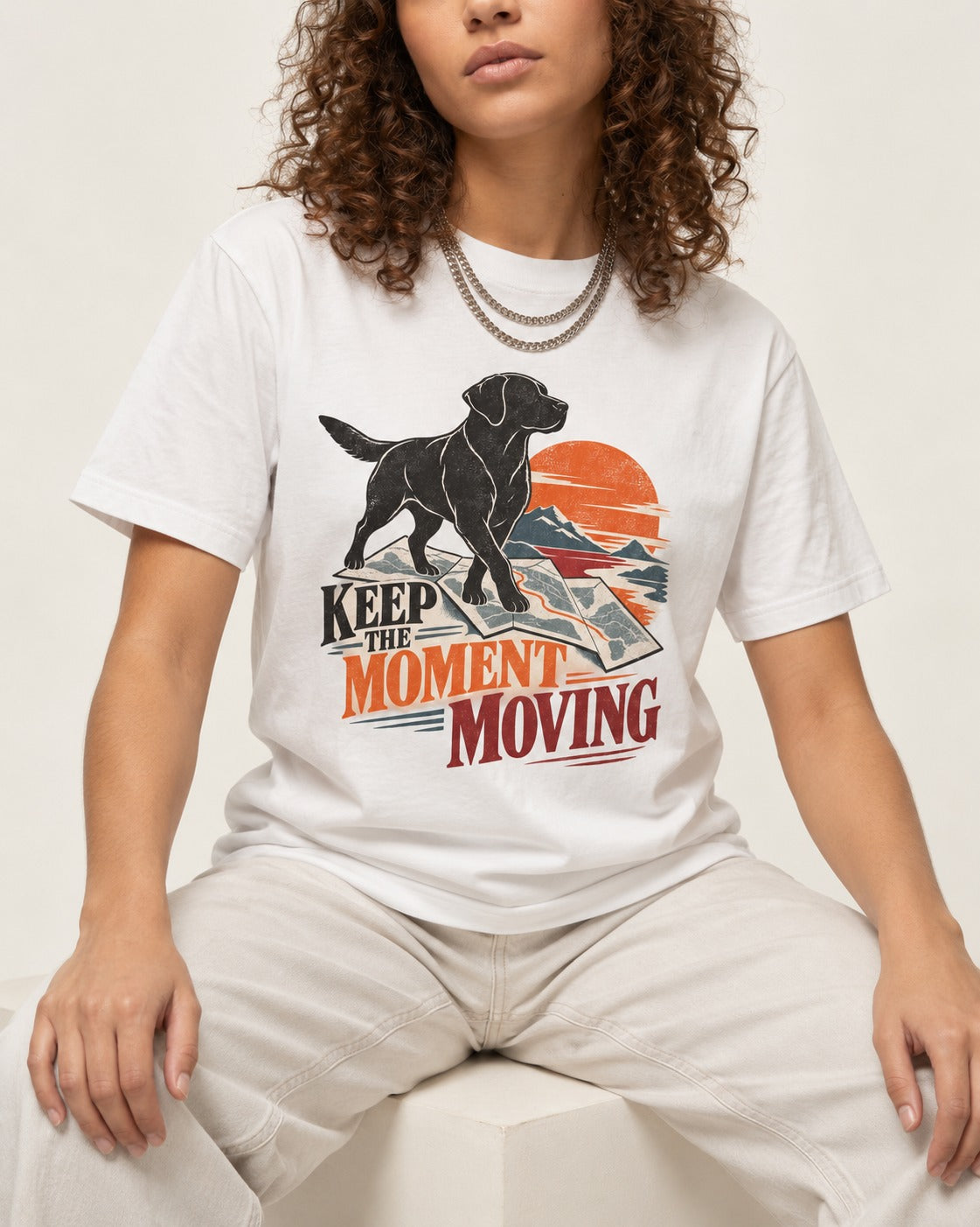 Keep the Moment Moving Labrador Retriever T-Shirt in White, worn by a seated model