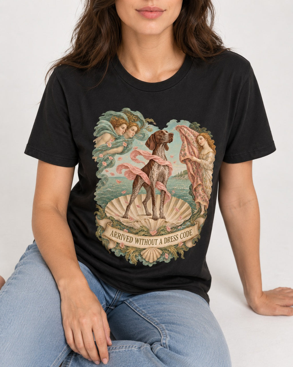 German Shorthaired Pointer Arrived Without A Dress Code Birth Of Venus Graphic T-Shirt in Black, worn by a seated model