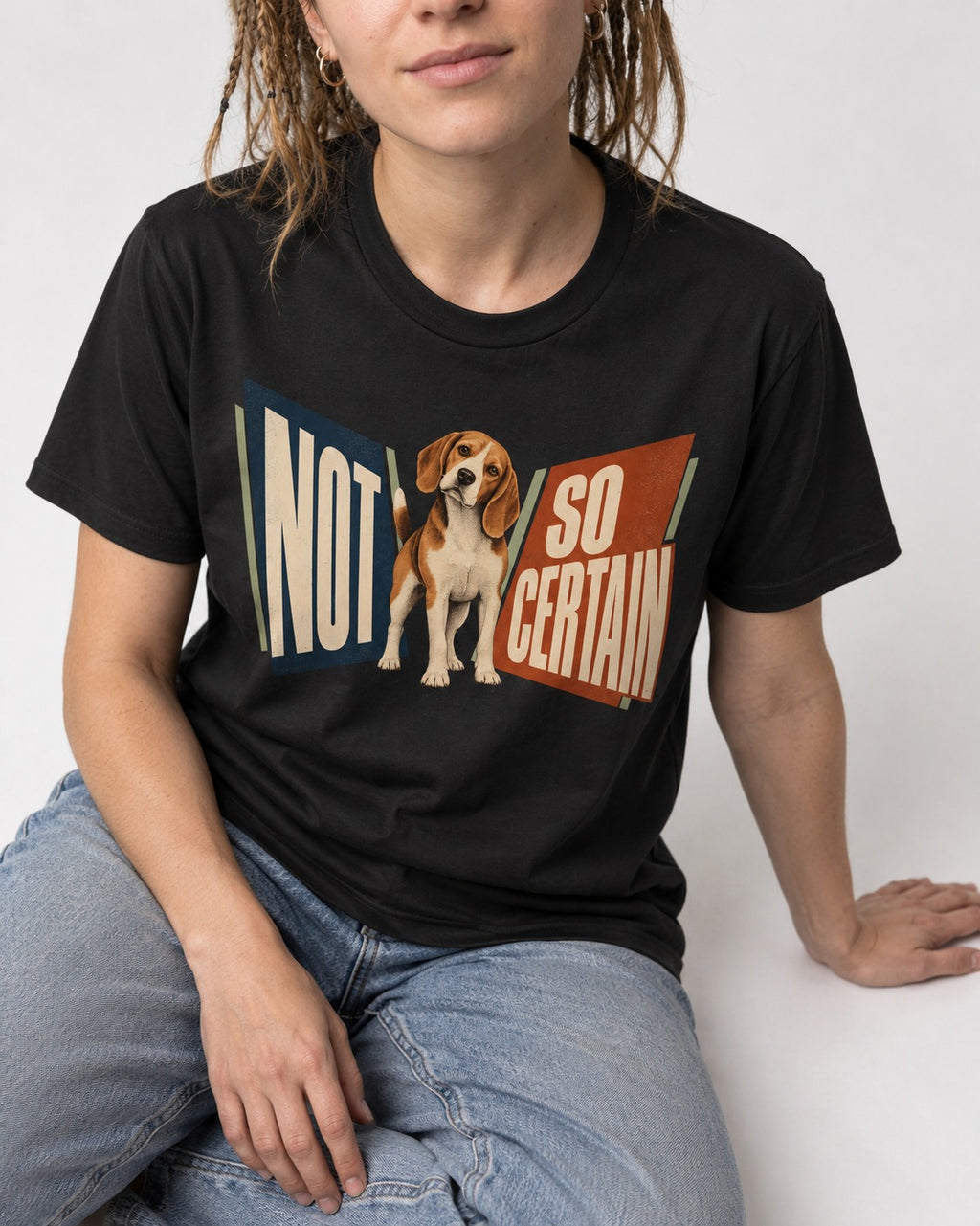 Beagle Not So Certain Retro Panel Graphic T-Shirt in Black, worn by a seated model
