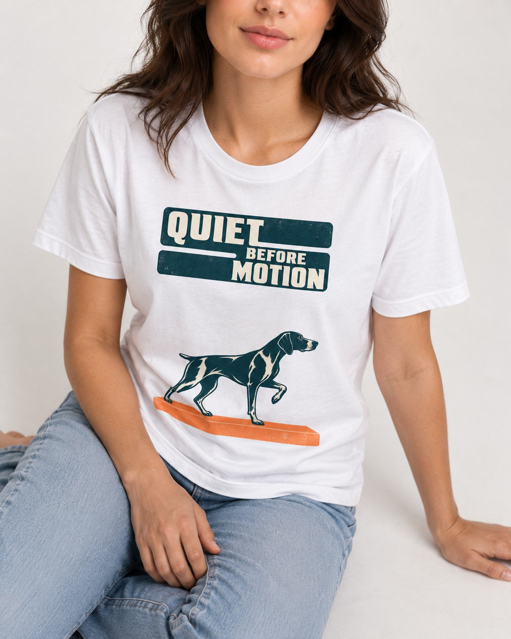 Quiet Before Motion German Shorthaired Pointer T-Shirt in White, worn by a seated model