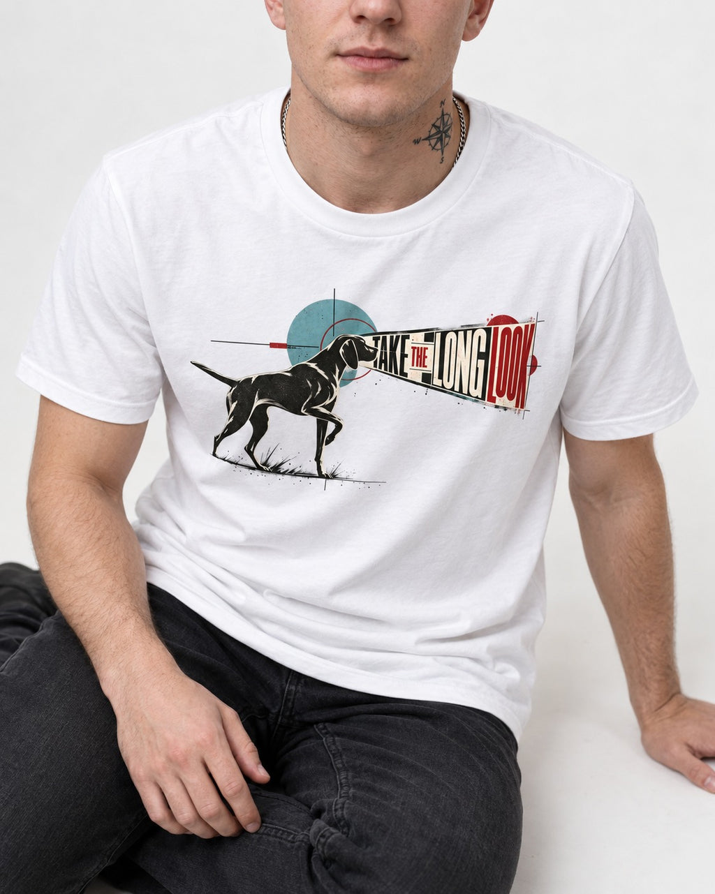 German Shorthaired Pointer Take the Long Look T-Shirt in White, worn by a seated model