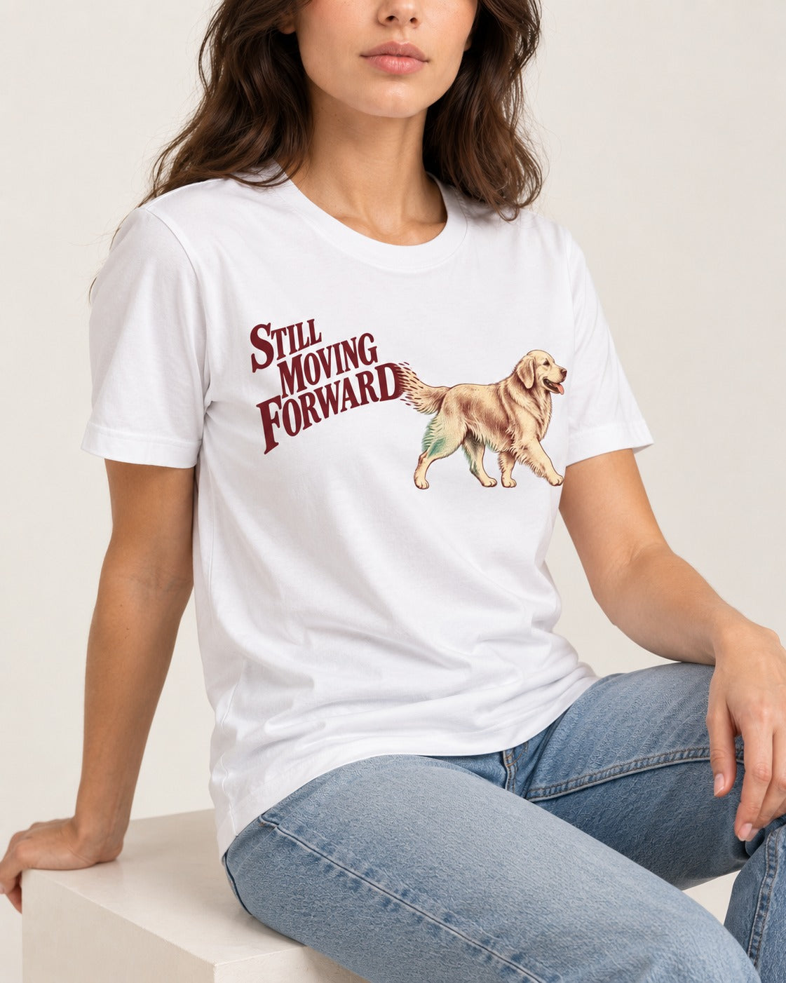 Golden Retriever Still Moving Forward T-Shirt in White, worn by a seated model