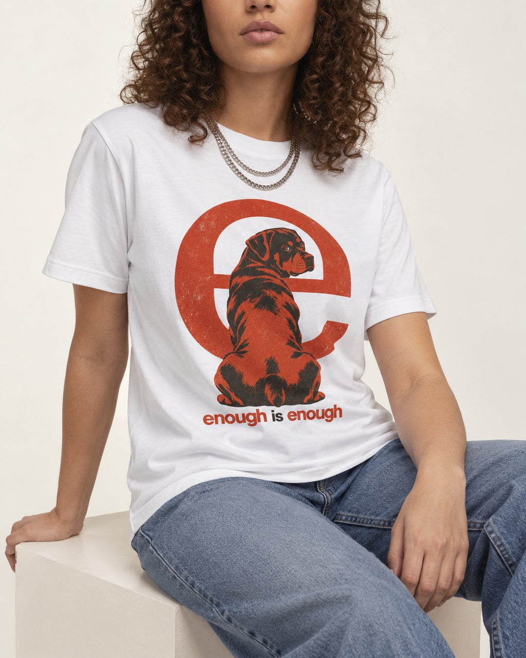 Rottweiler Enough Is Enough T-Shirt in White, worn by a seated model