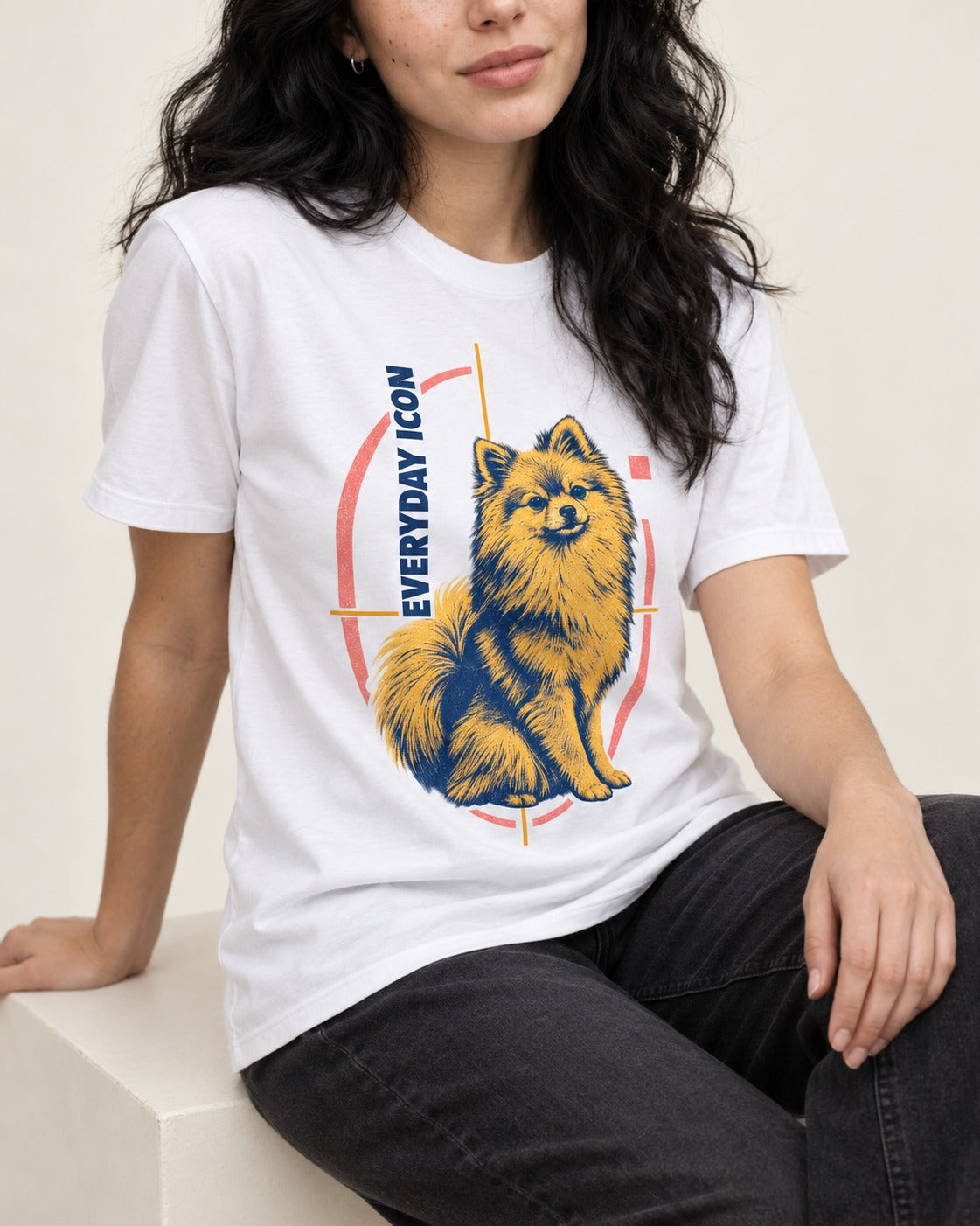 Pomeranian Everyday Icon T-Shirt in White, worn by a seated model
