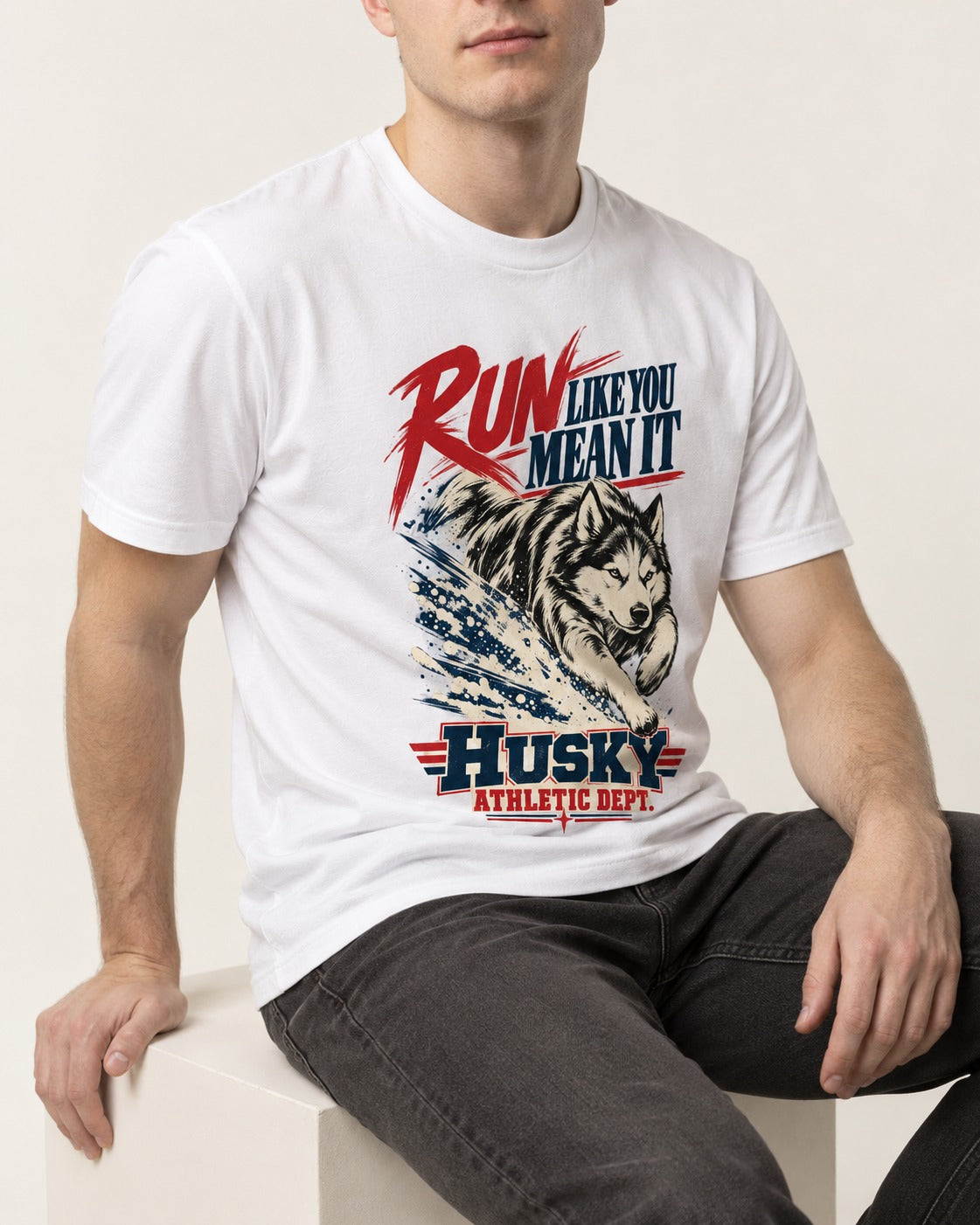 Husky Run with Purpose T-Shirt in White, worn by a seated model