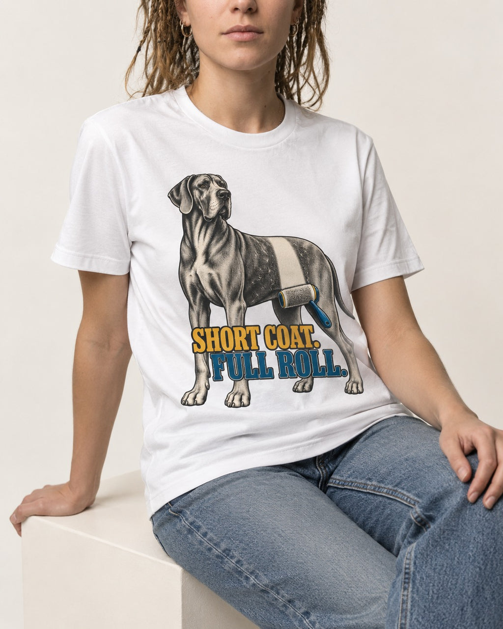 Short Coat Full Roll Great Dane T-Shirt in White, worn by a seated model