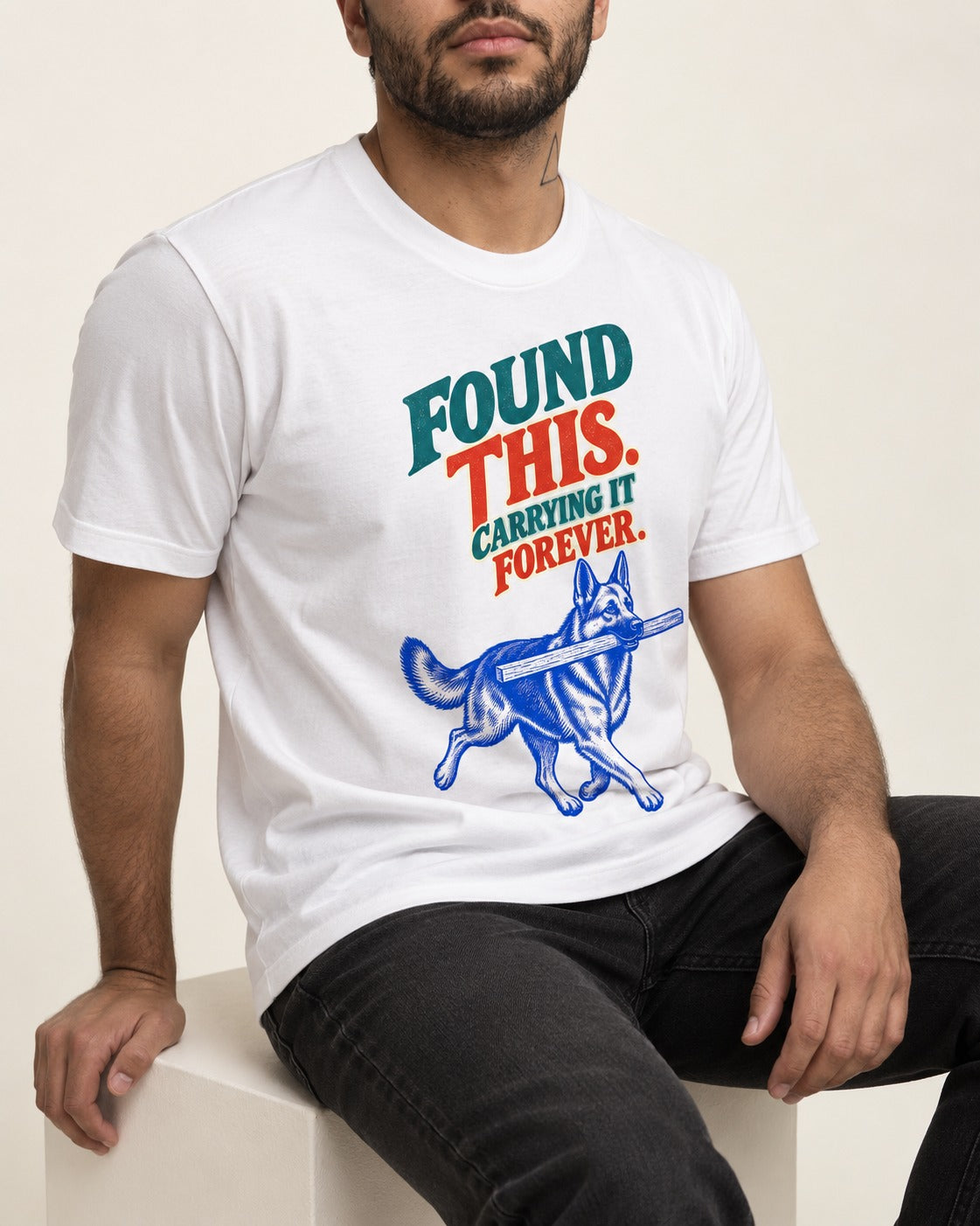 German Shepherd Dog Carrying It Forever T-Shirt in White, worn by a seated model