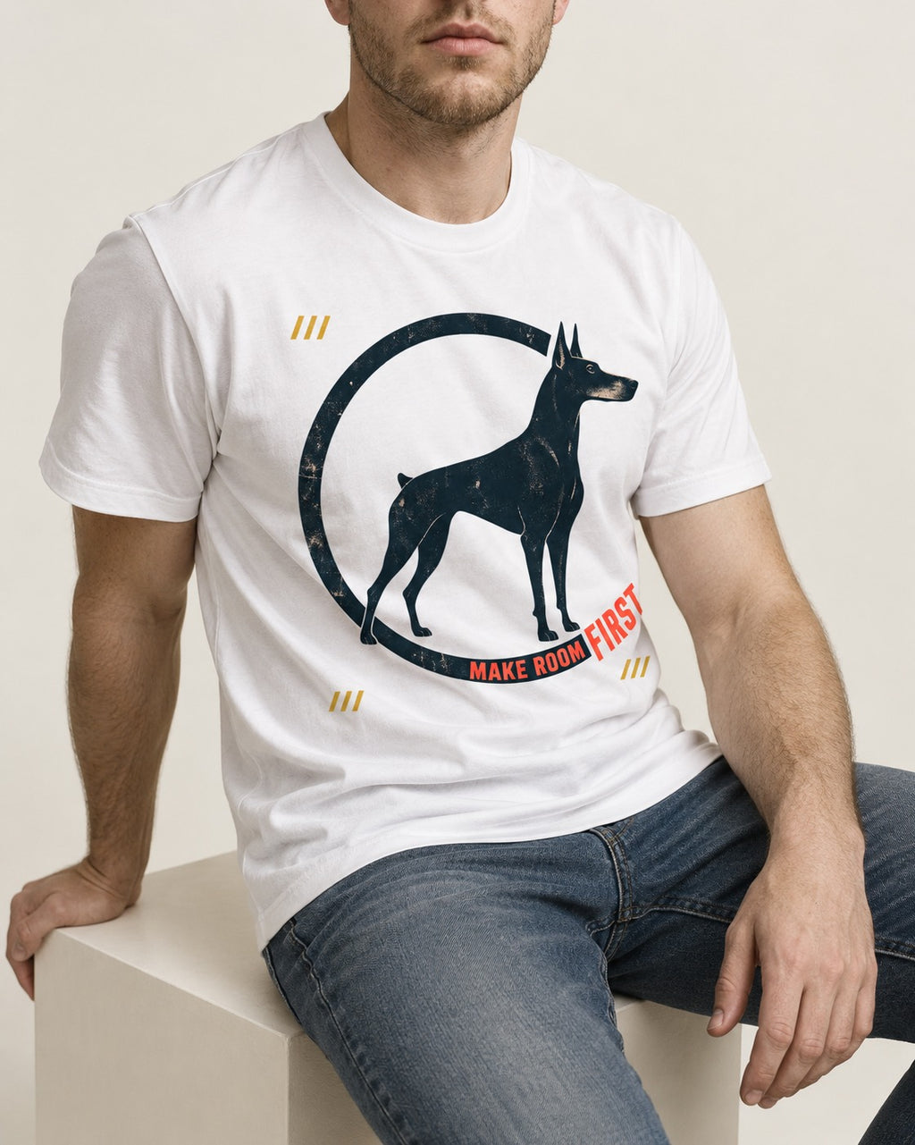 Make Room First Doberman T-Shirt in White, worn by a seated model