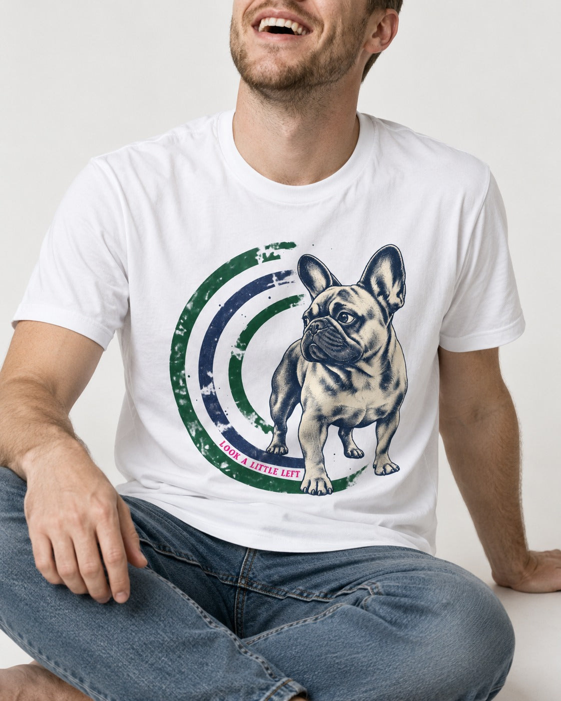 Frenchie Look a Little Left Orbit Graphic T-Shirt in White, worn by a seated model