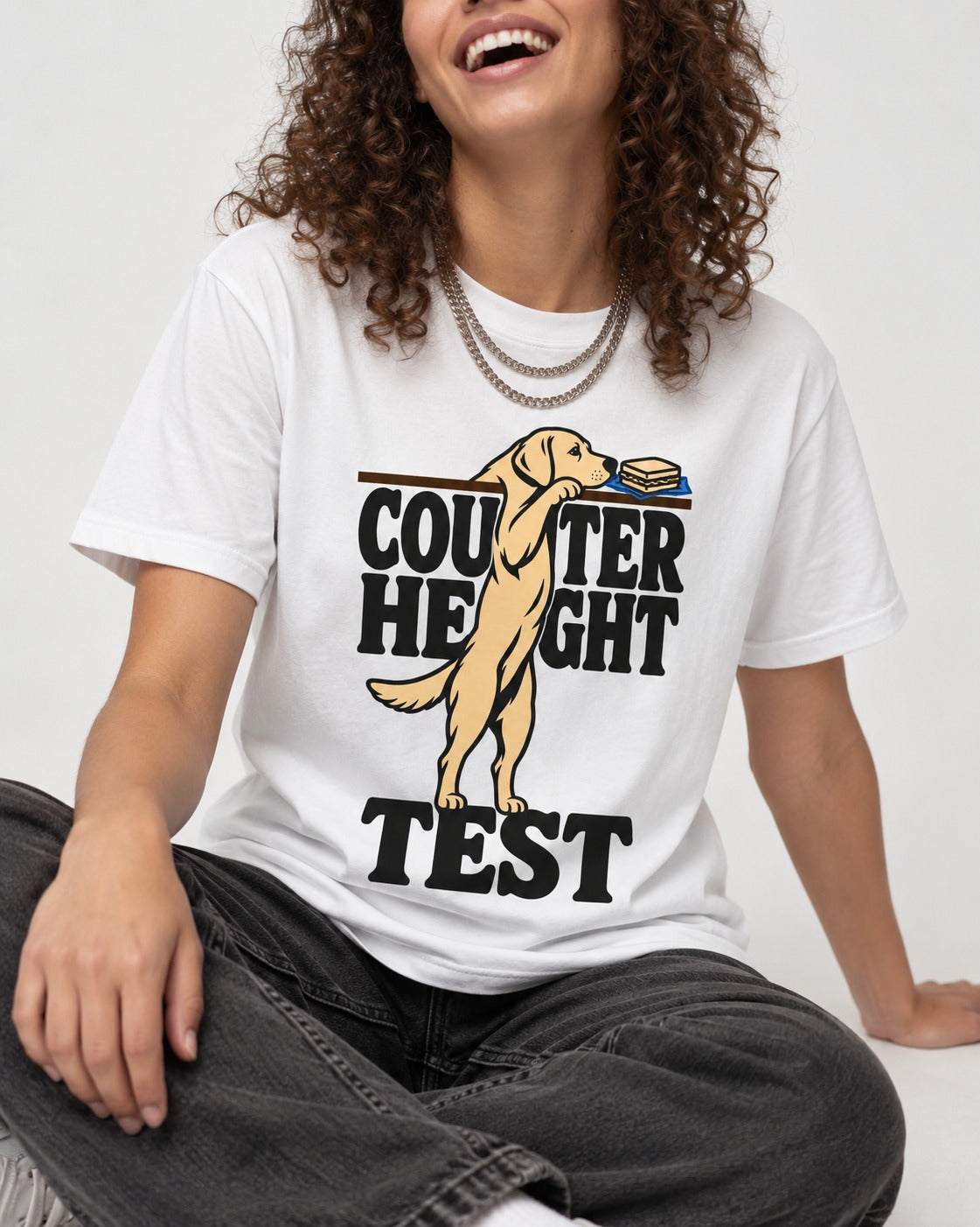 Labrador Retriever Counter Height Test T-Shirt in White, worn by a seated model
