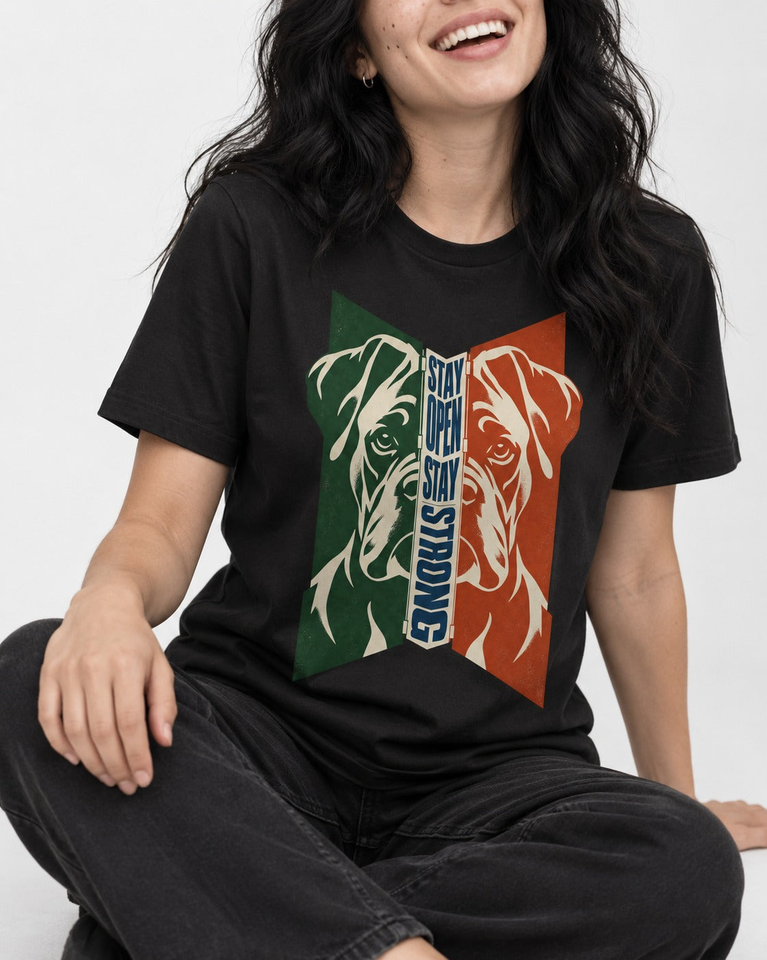 Boxer Stay Open Stay Strong T-Shirt in Black, worn by a seated model