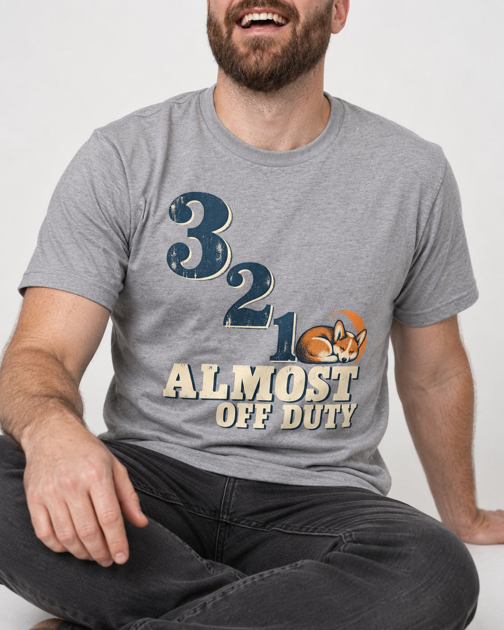 Corgi Almost Off Duty T-Shirt in Sport Grey, worn by a seated model