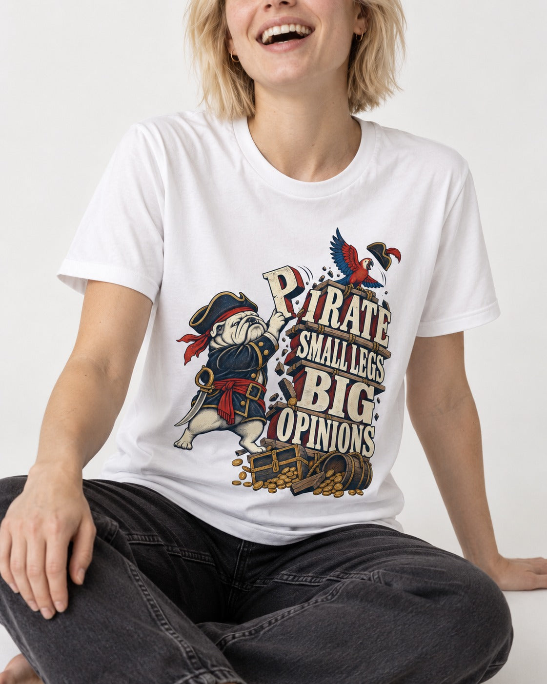 Pirate English Bulldog Big Opinions T-Shirt in White, worn by a seated model