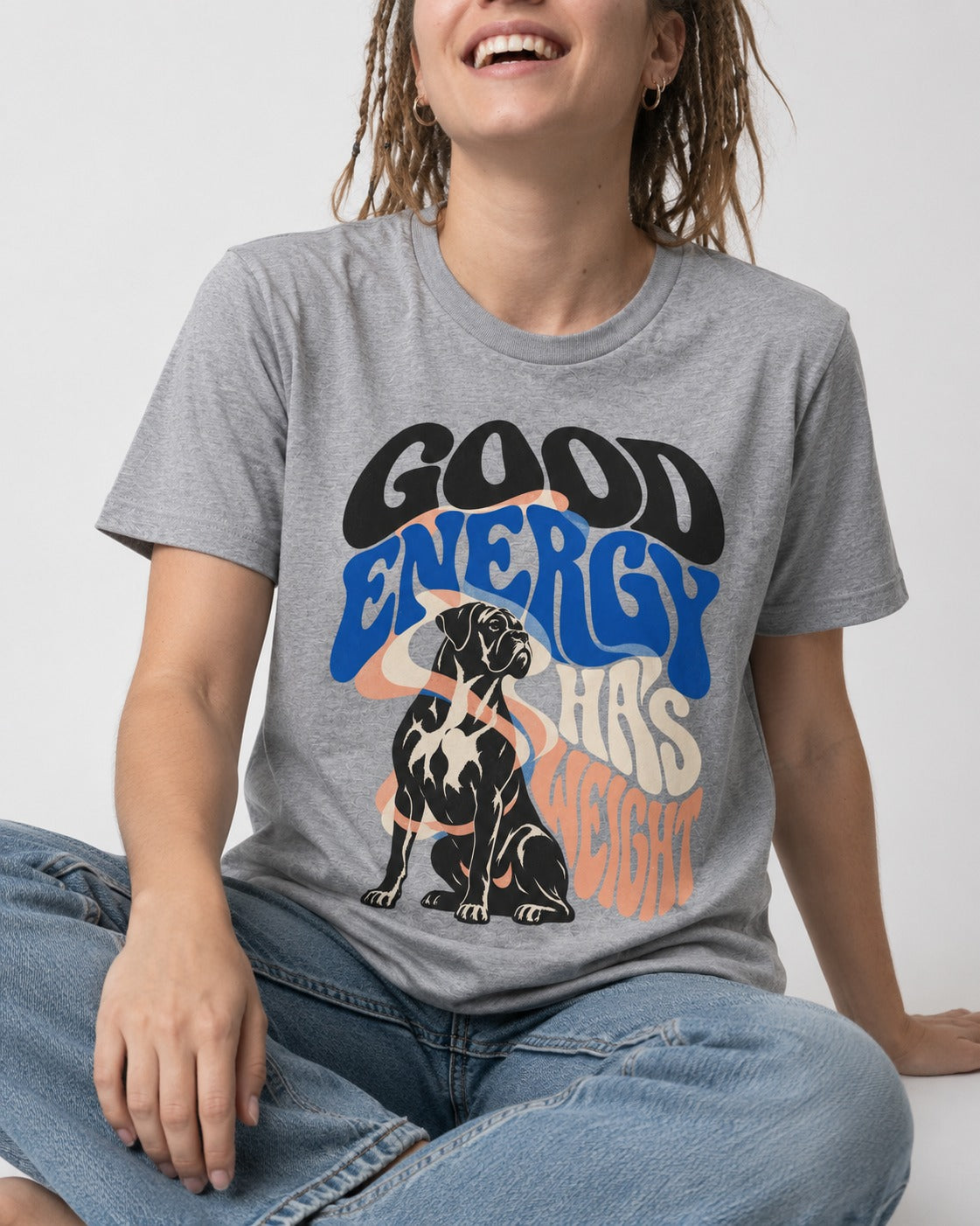 Good Energy Has Weight Boxer Retro Typography T-Shirt in Sport Grey, worn by a seated model