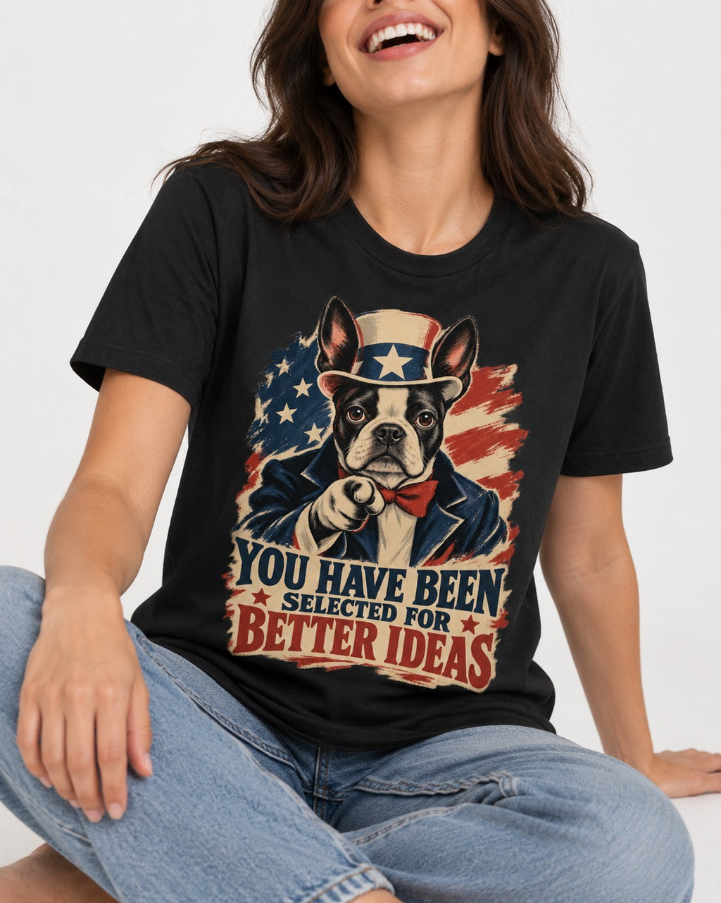 You Have Been Selected for Better Ideas Boston Terrier T-Shirt in Black, worn by a seated model