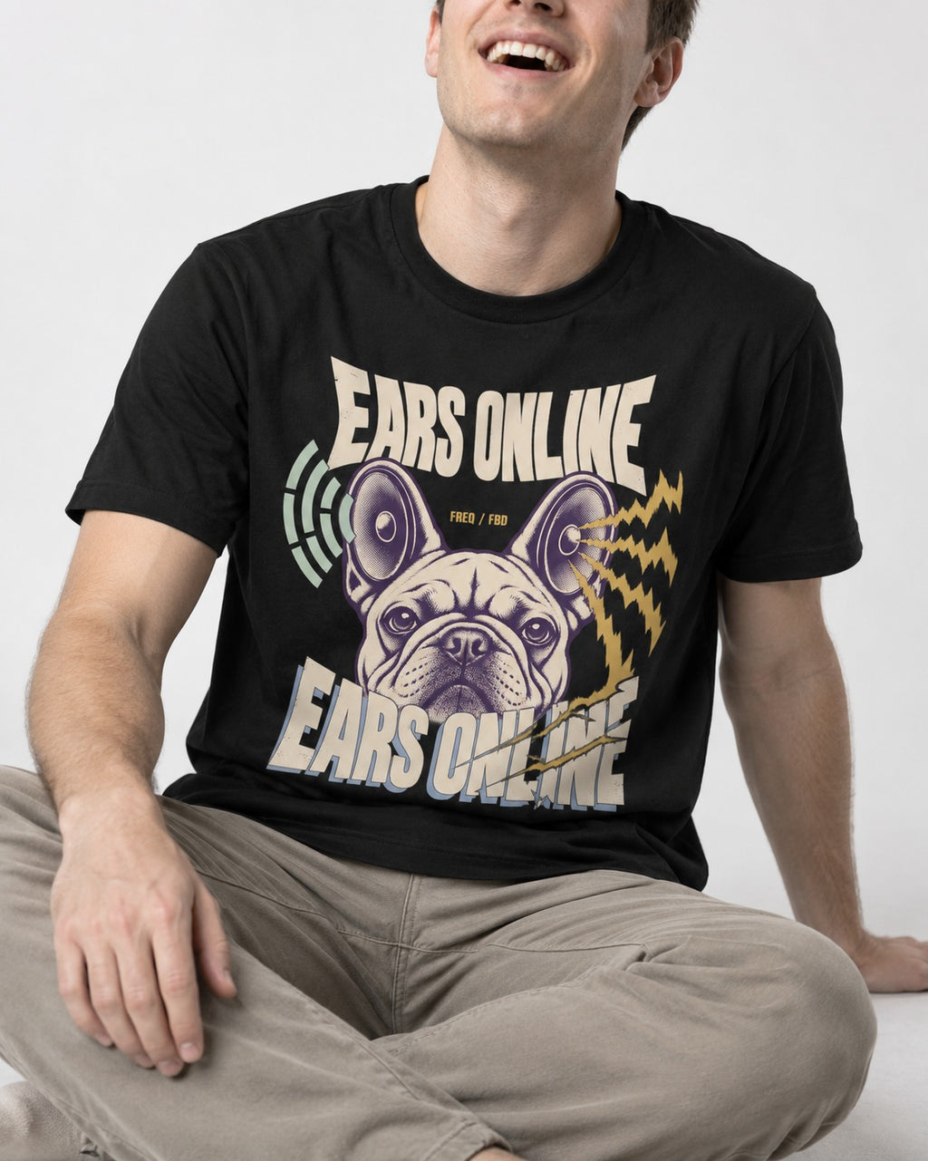 Frenchie Ears Online Audio Signal Graphic T-Shirt in Black, worn by a seated model