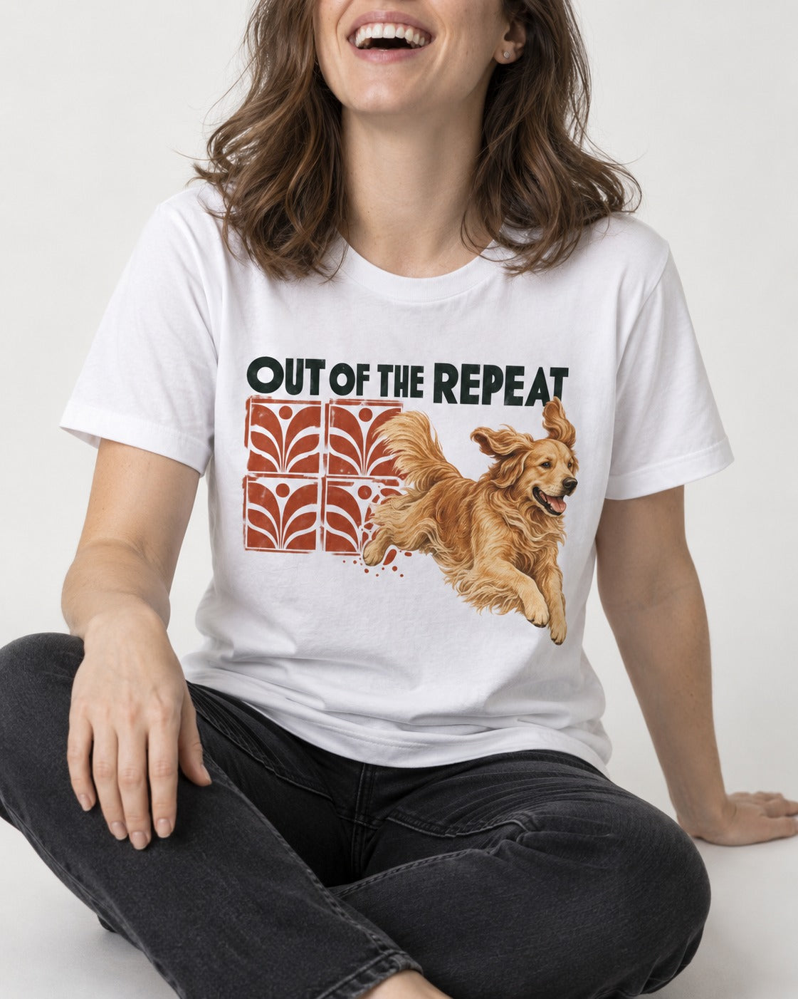 Golden Retriever Out of the Repeat T-Shirt in White, worn by a seated model